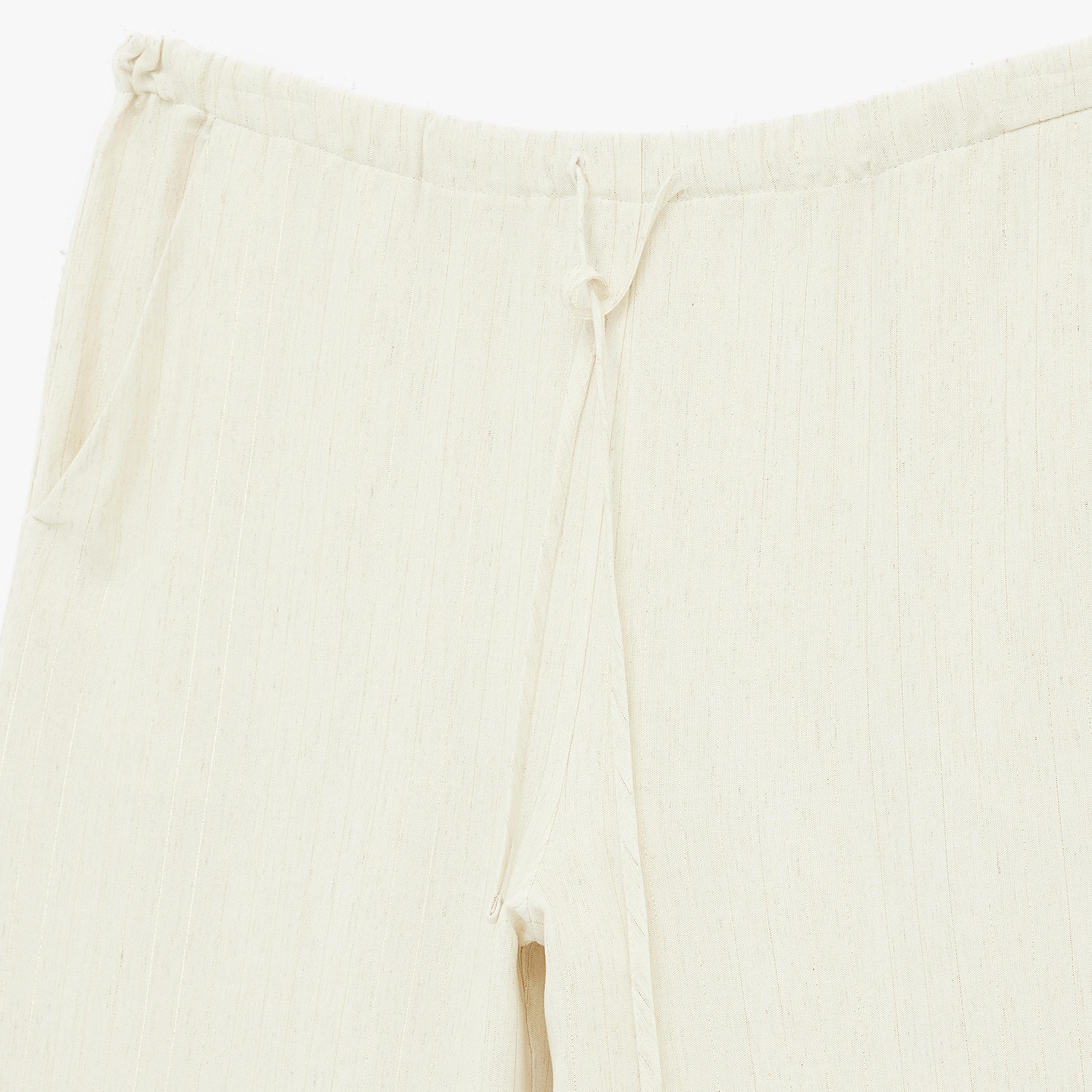 بنطلون نسائي واسع الساق بقماش كتان سادة بخصر برباط بلون كريمي من كوتون-women-clothing-bottoms-trousers-image-6