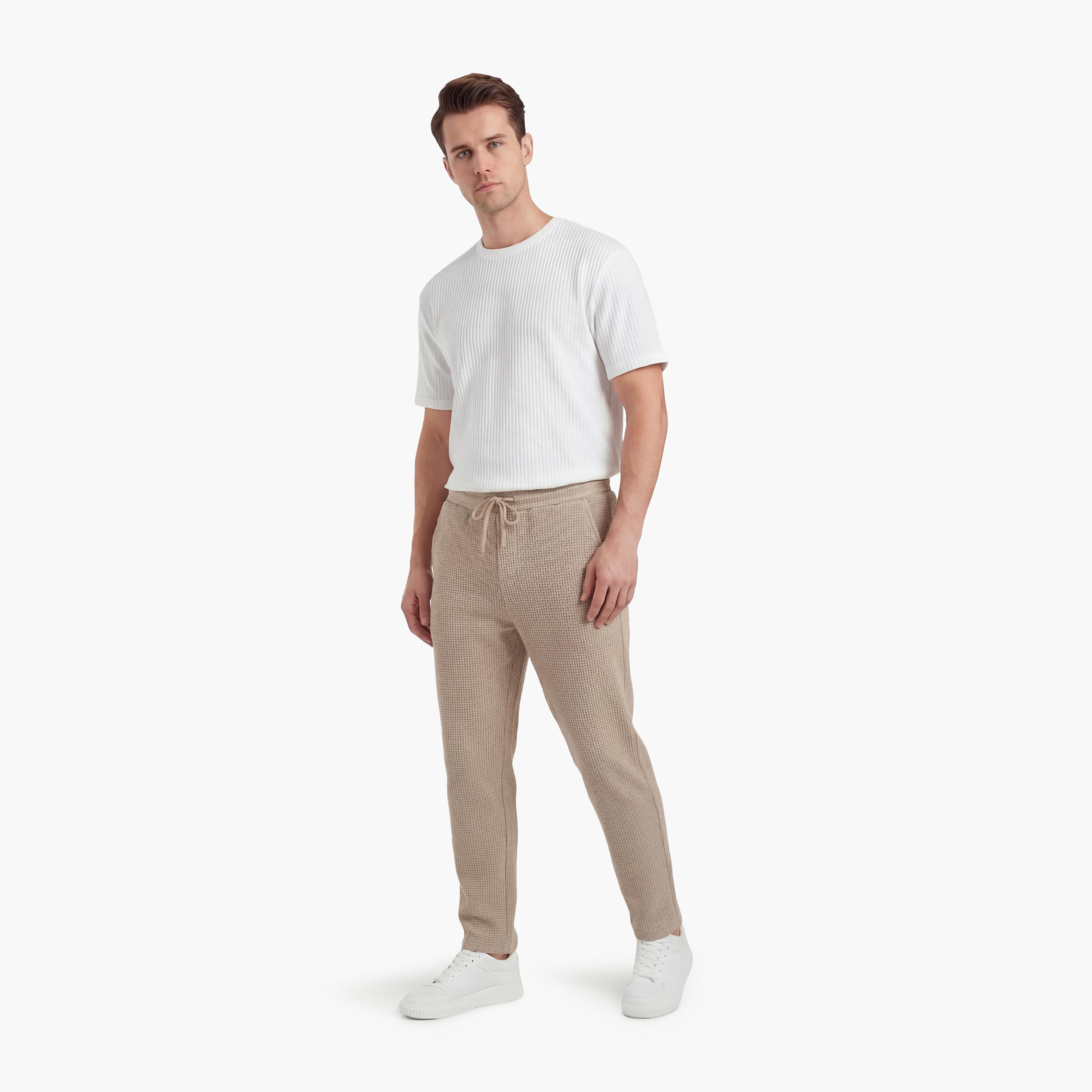 بنطلون رجالي خصر متوسط قصة "ريجولار فت" بخصر برباط من كوتون-men-clothing-bottoms-trousersandchinos-trousers-image-2
