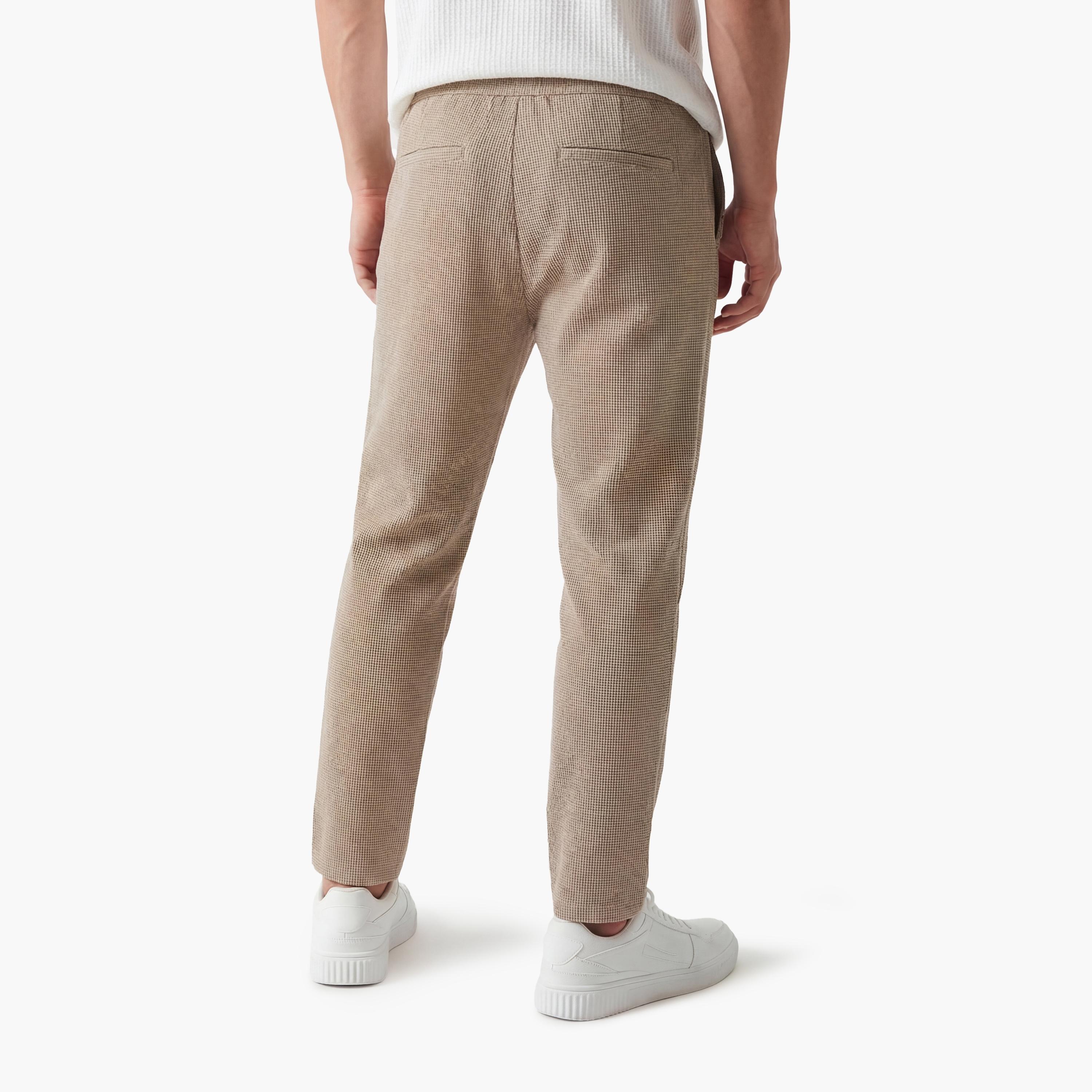 بنطلون رجالي خصر متوسط قصة "ريجولار فت" بخصر برباط من كوتون-men-clothing-bottoms-trousersandchinos-trousers-image-3