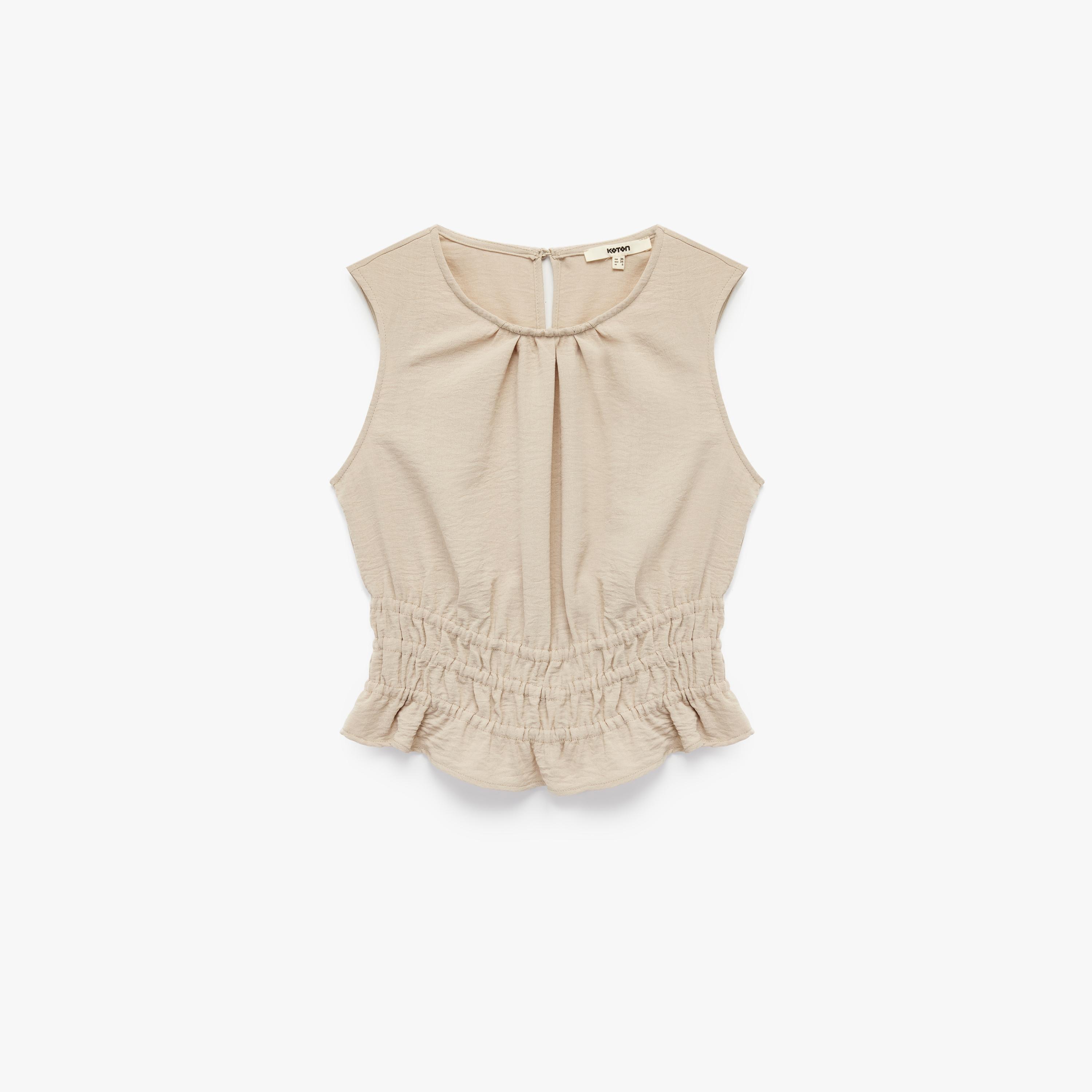 بلوزة نسائية من قماش ايروبين بارز الملمس بلون بيج من كوتون-women-clothing-shirtsandblouses-blouses-image-4
