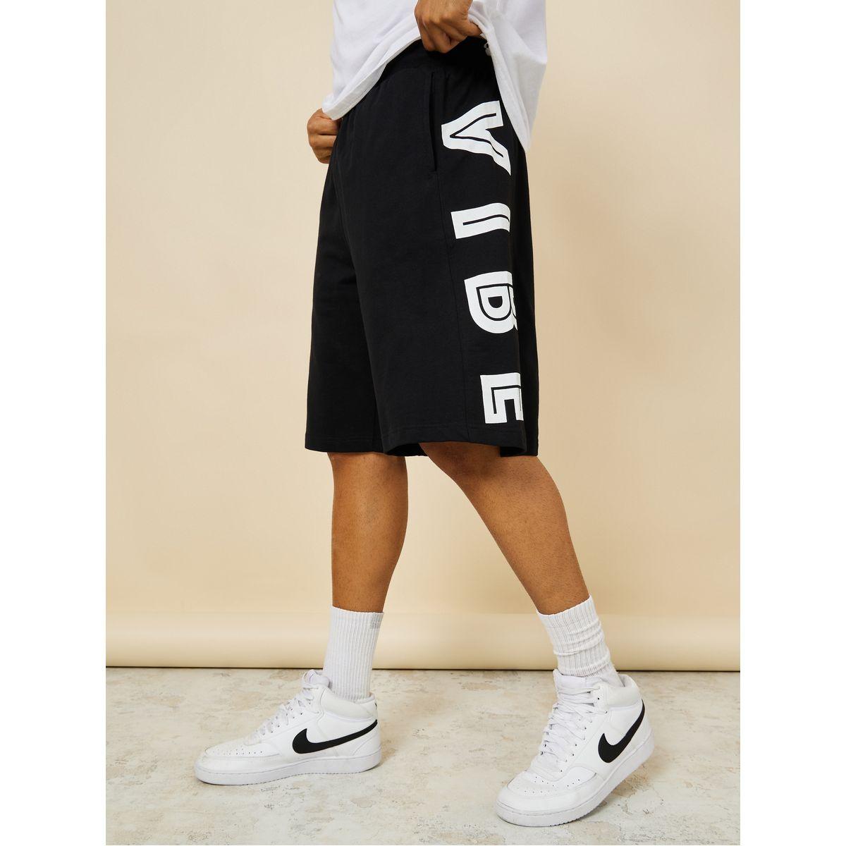 شورت مطبع بكتابة وقصة واسعة-men-clothing-bottoms-shorts-image-1