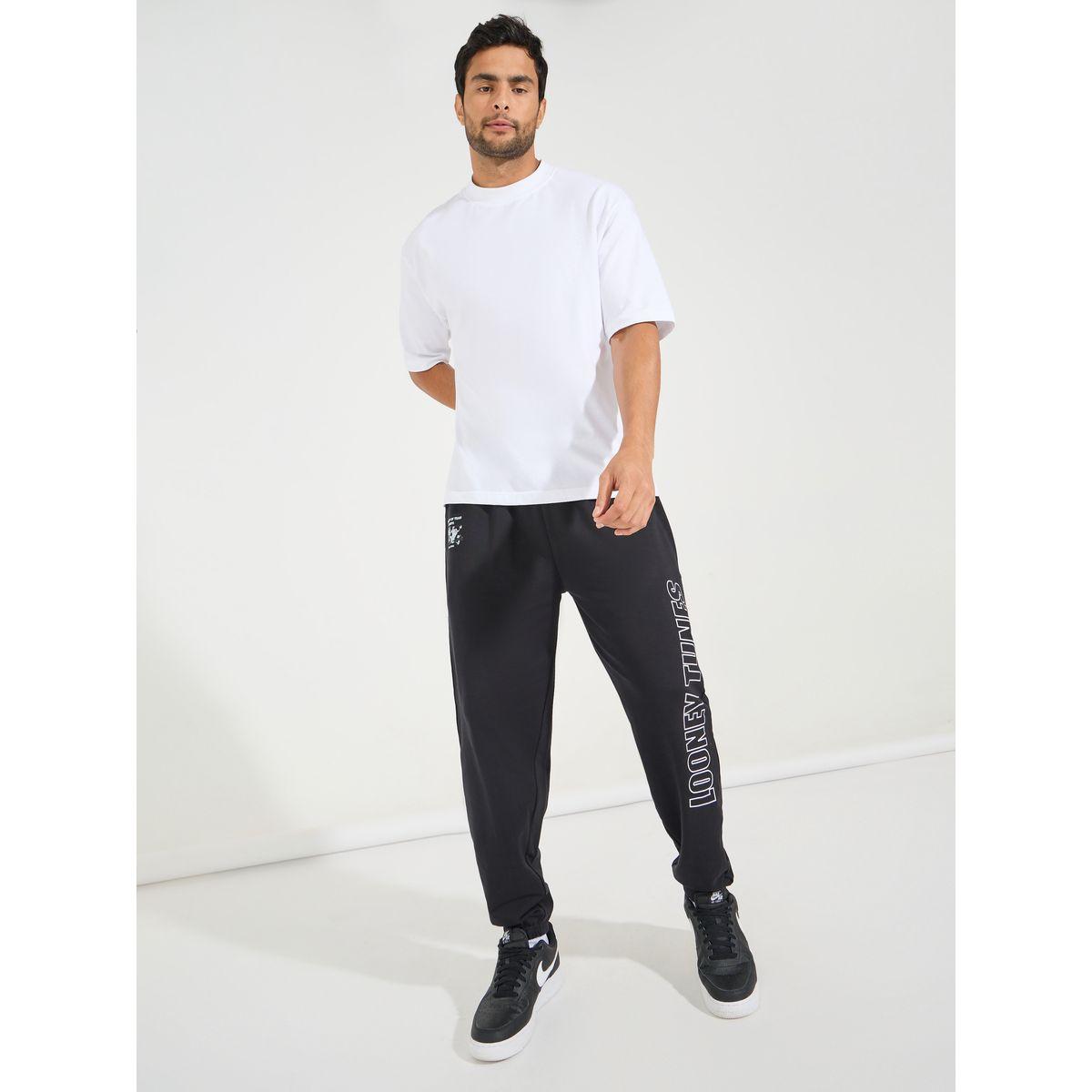 جوغر فضفاض مطبع بشخصية لوني تونز-men-clothing-bottoms-joggers-image-2