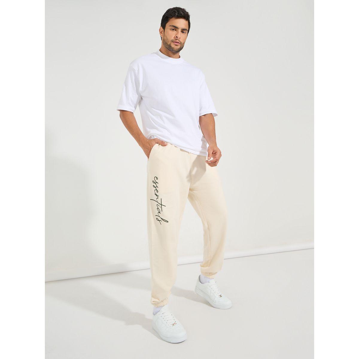 جوغر بقصة فضفاضة مطبع بكتابة مع جيب-men-clothing-bottoms-joggers-image-2