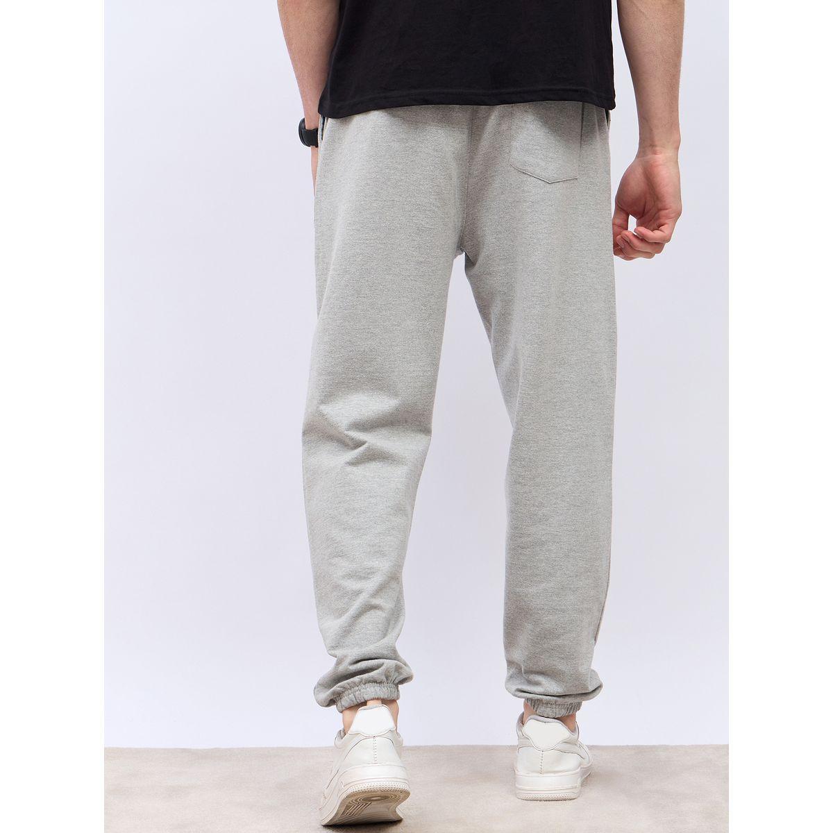 جوغر بقصة فضفاضة وطبعة بليسمنت-men-clothing-bottoms-joggers-image-6