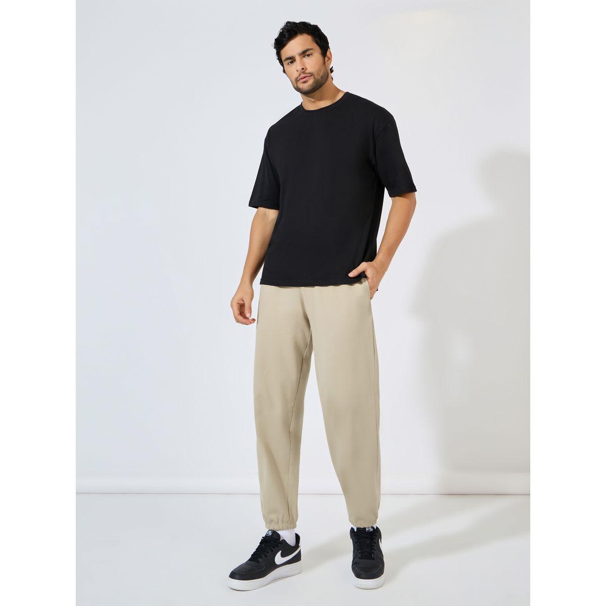 جوغر تيري بقصة مريحة وحافة مطاطية-men-clothing-bottoms-joggers-image-2