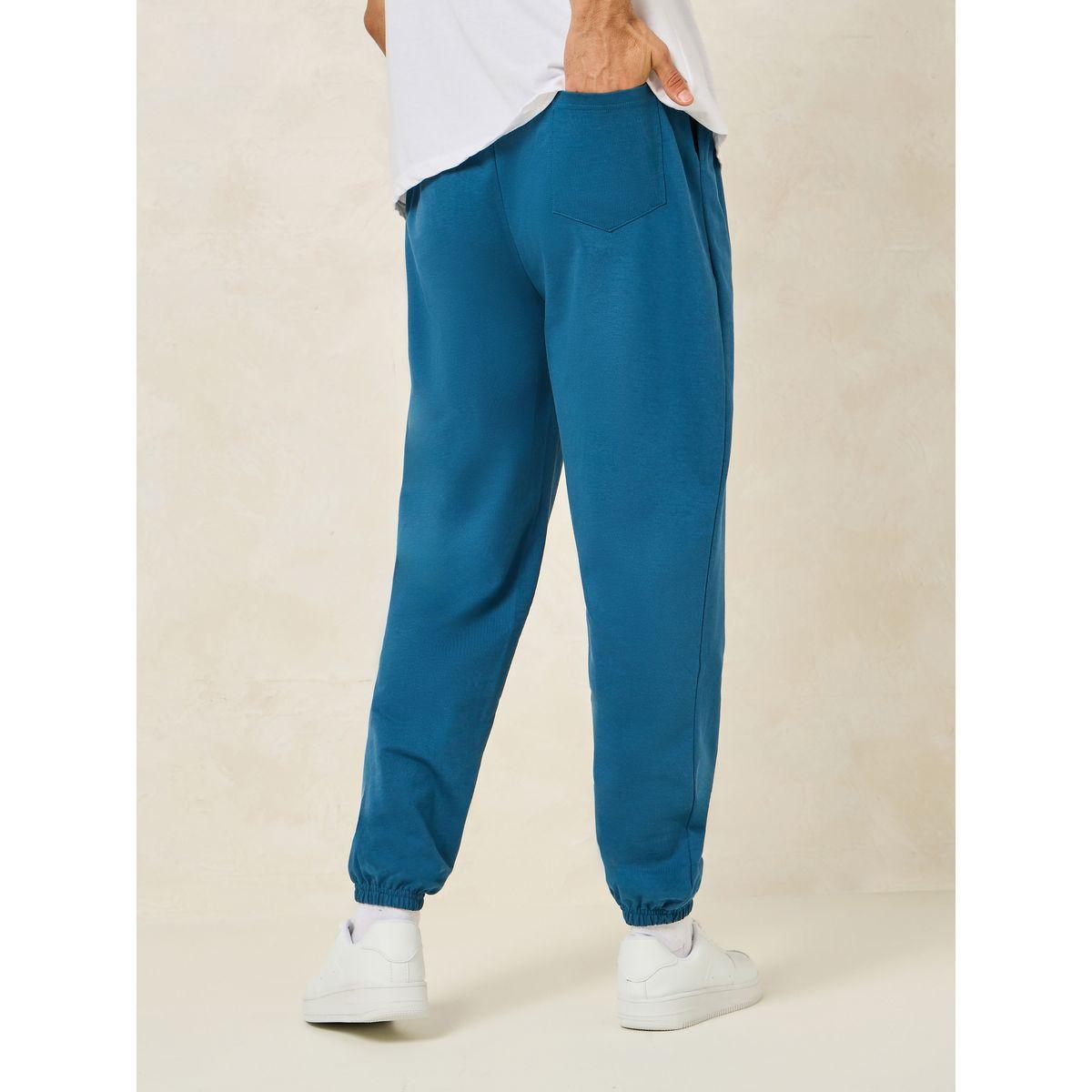 جوغر فضفاض بحافة مطاطية-men-clothing-bottoms-joggers-image-1