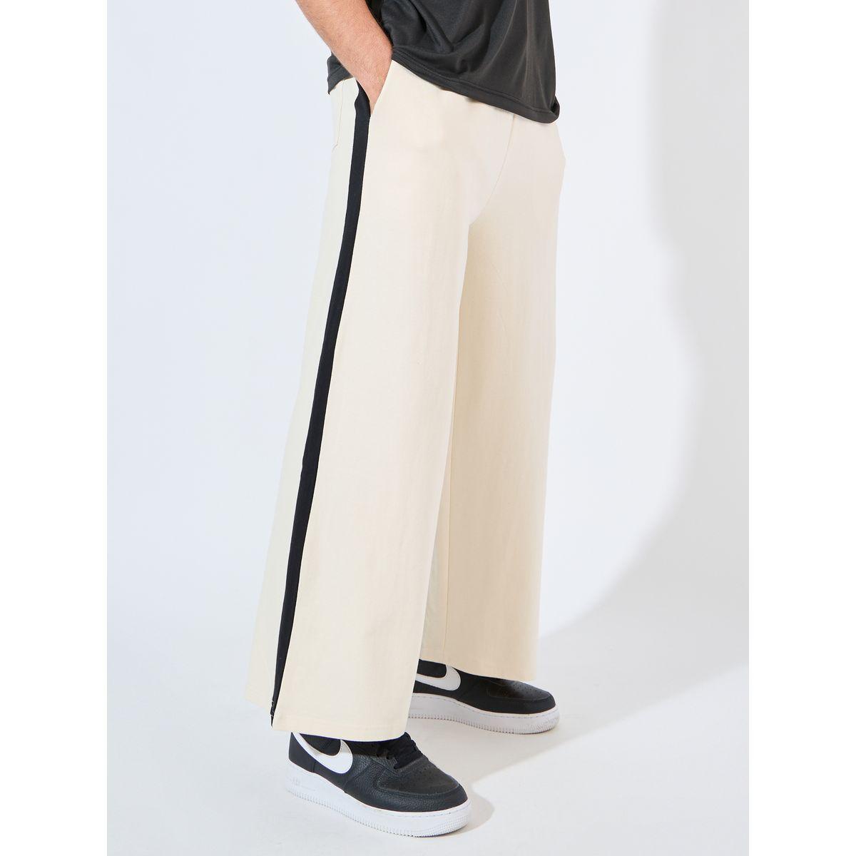جوغر بأرجل فضفاضة وتداخلات مُتباينة-men-clothing-bottoms-joggers-image-1