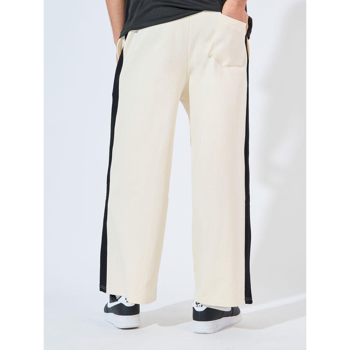 جوغر بأرجل فضفاضة وتداخلات مُتباينة-men-clothing-bottoms-joggers-image-5