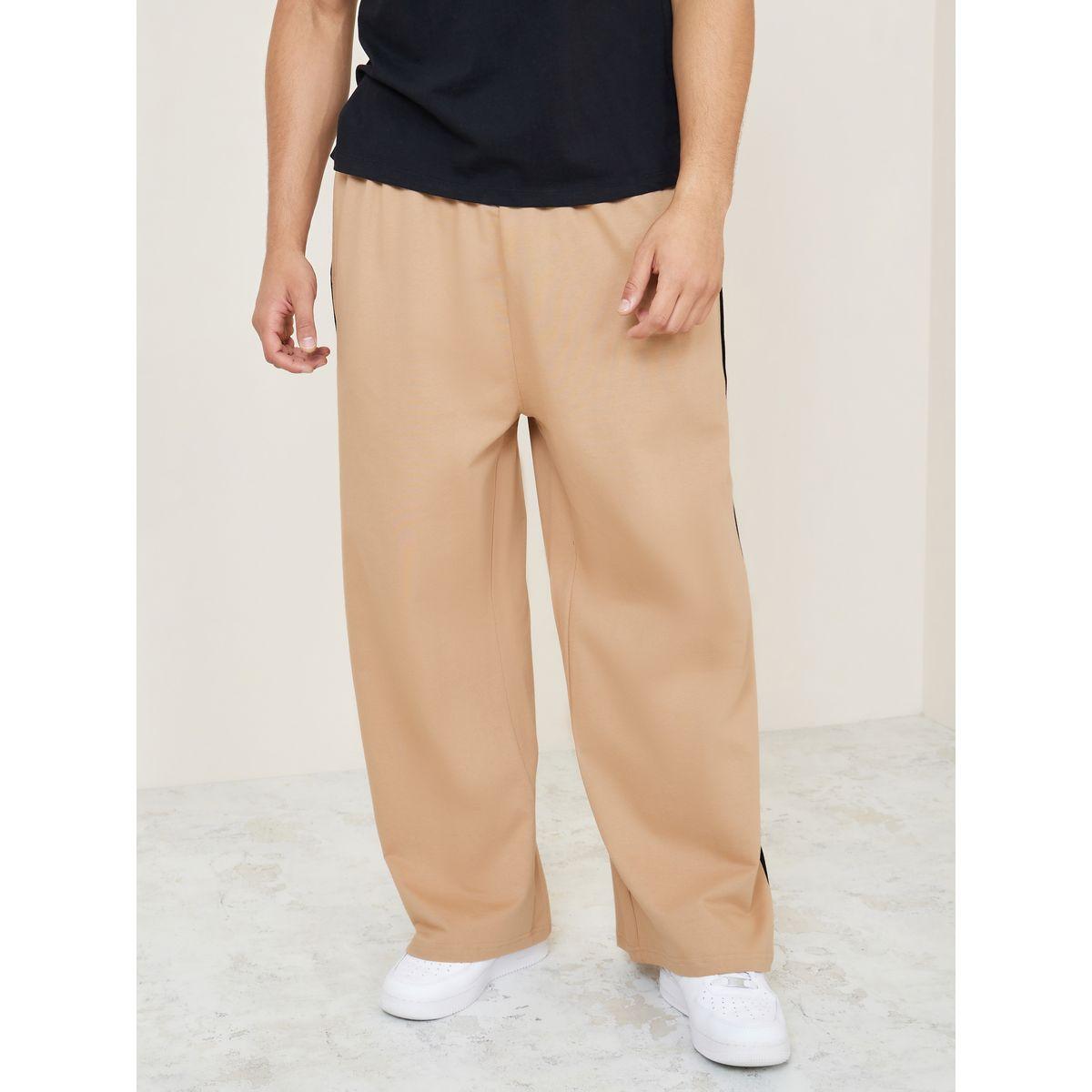 جوغر بقصة واسعة وخط جانبي-men-clothing-bottoms-joggers-image-1