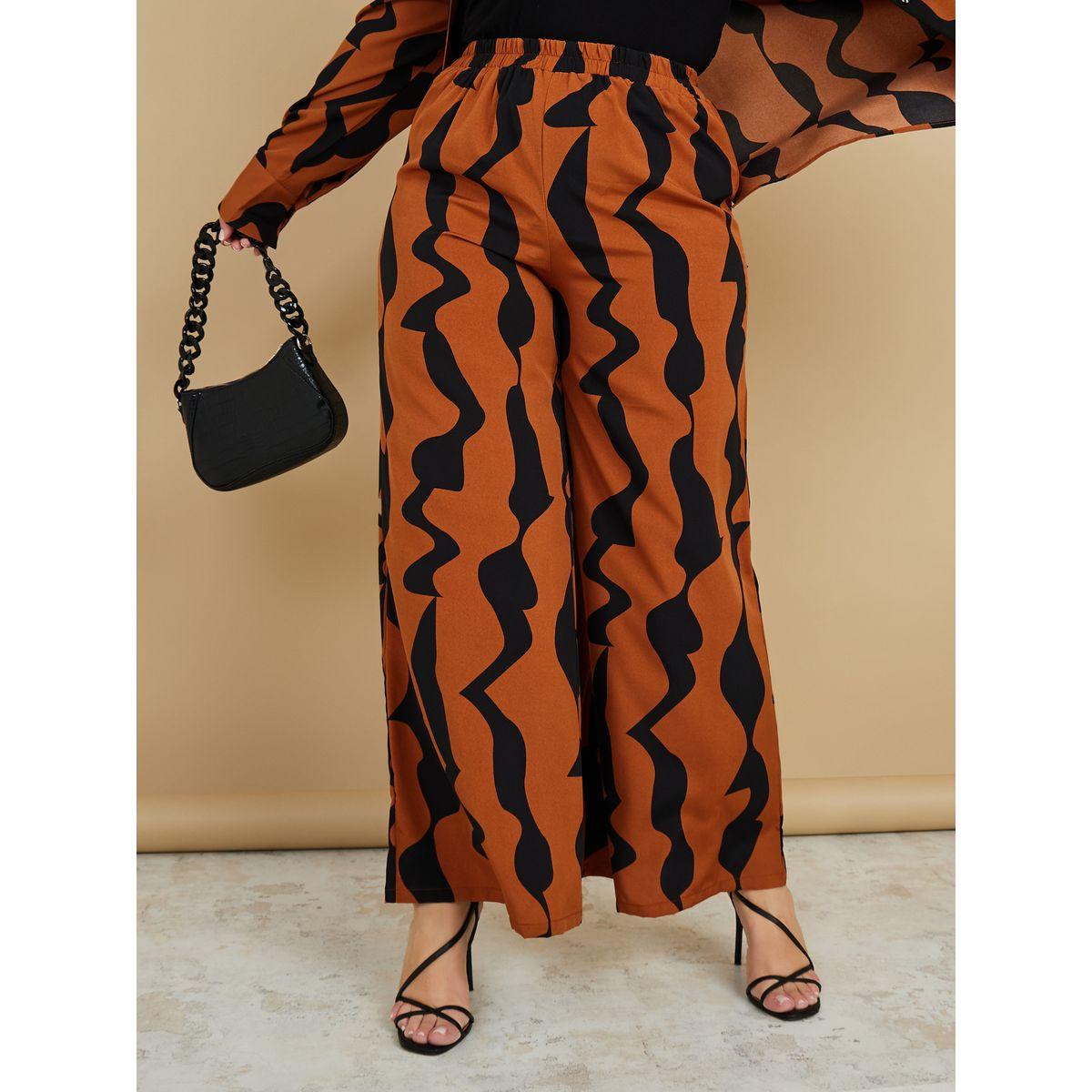 Styli Plus Abstract Print Wide Leg Trouser-women-clothing-bottoms-trousers-image-1
