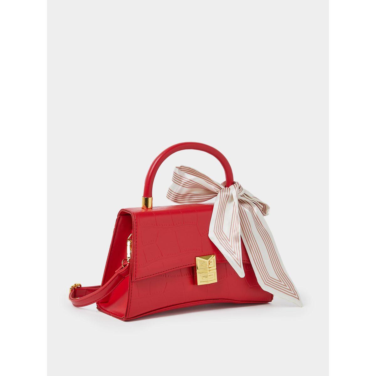 شنطة يد بتفاصيل بارزة الملمس-women-bagsandwallets-handbags-image-1