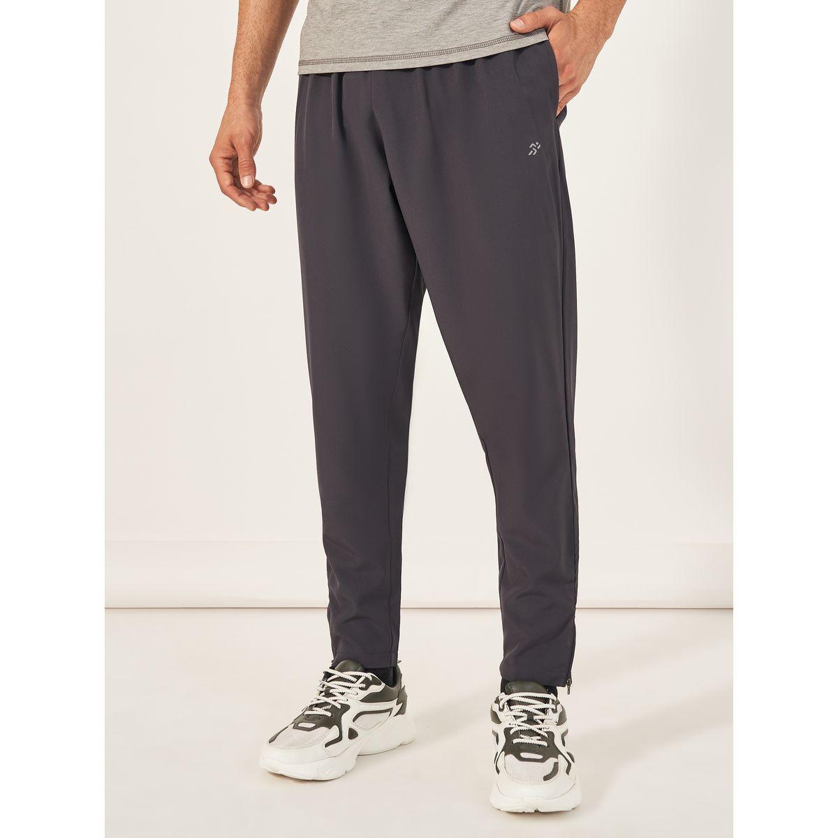 بنطال رياضي منسوج للجري مع حواف بسحَّاب غلق-men-clothing-sportswearandactivewear-bottoms-image-1