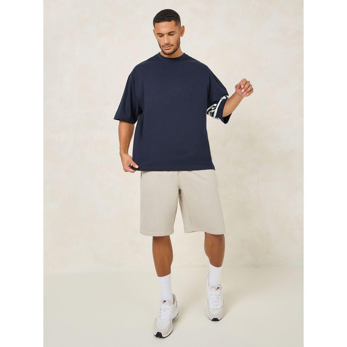 تيشيرت جيرسيه باكمام مخططة وقصة بوكسي-men-clothing-tshirtsandpolos-tshirts-image-2