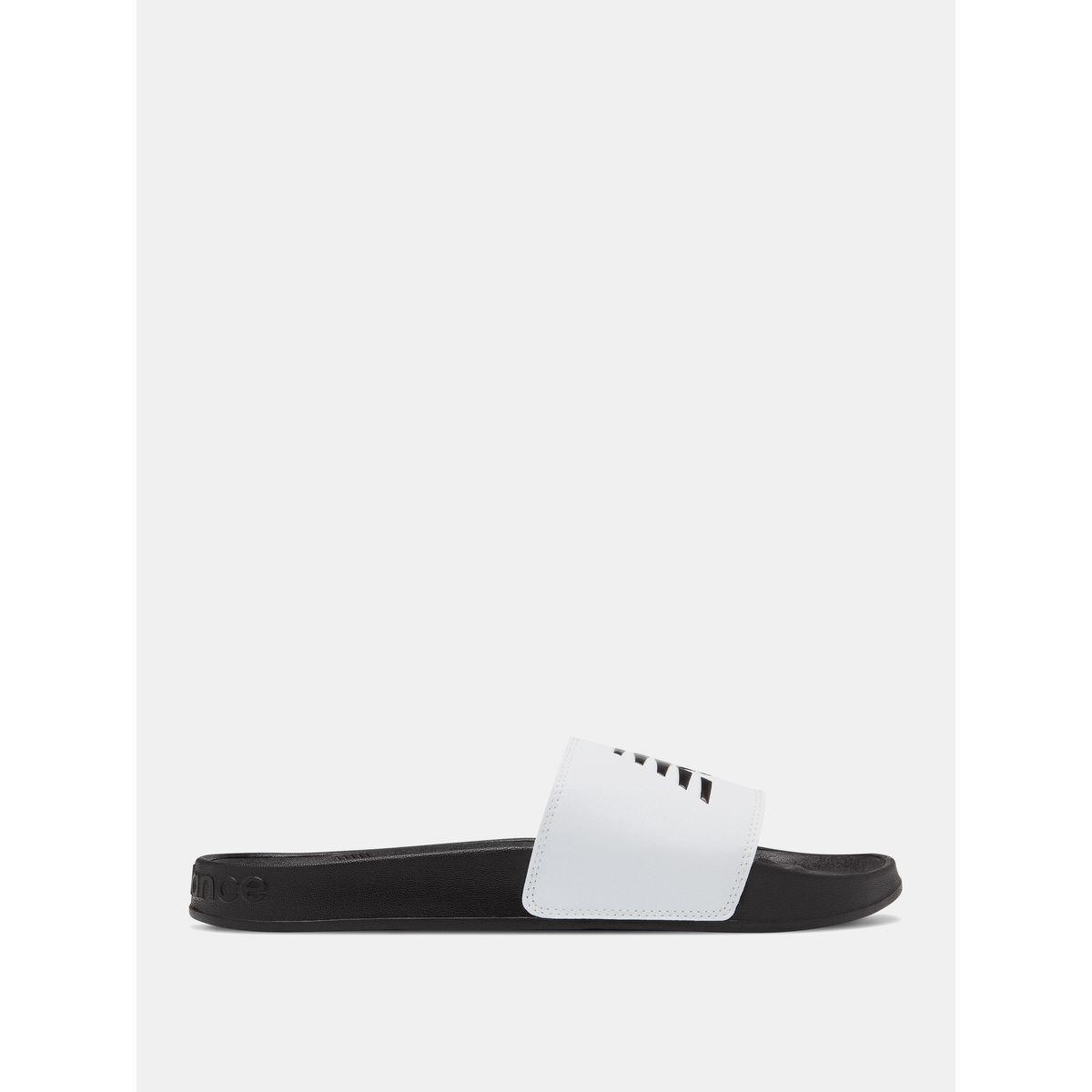 شبشب مطبع بشعار الماركة-women-shoes-flipflopsandslides-image-2
