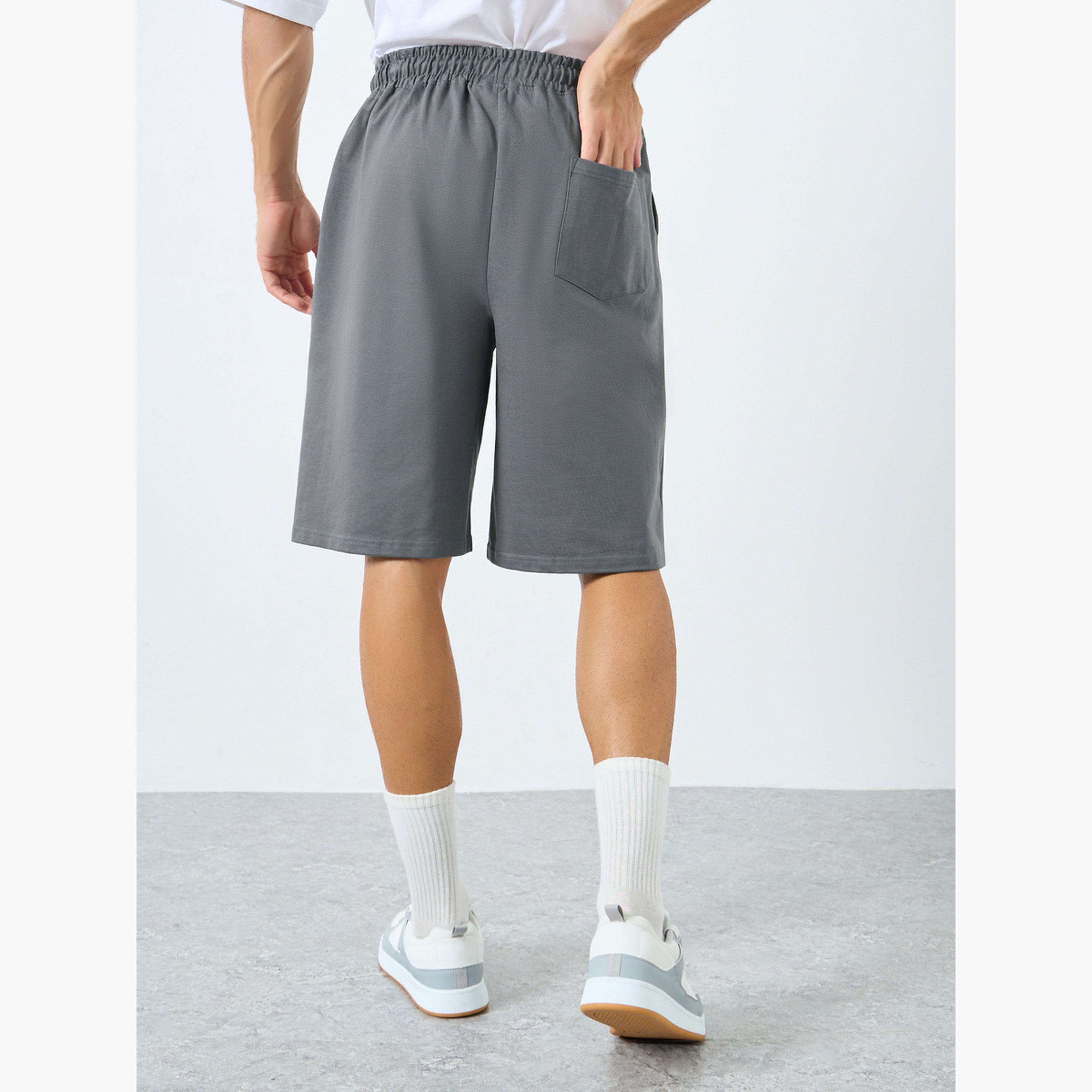 ستايلي - شورت تيري قطني مقاس كبير اوفر سايز  بطبعة شعار-men-clothing-bottoms-shorts-image-3