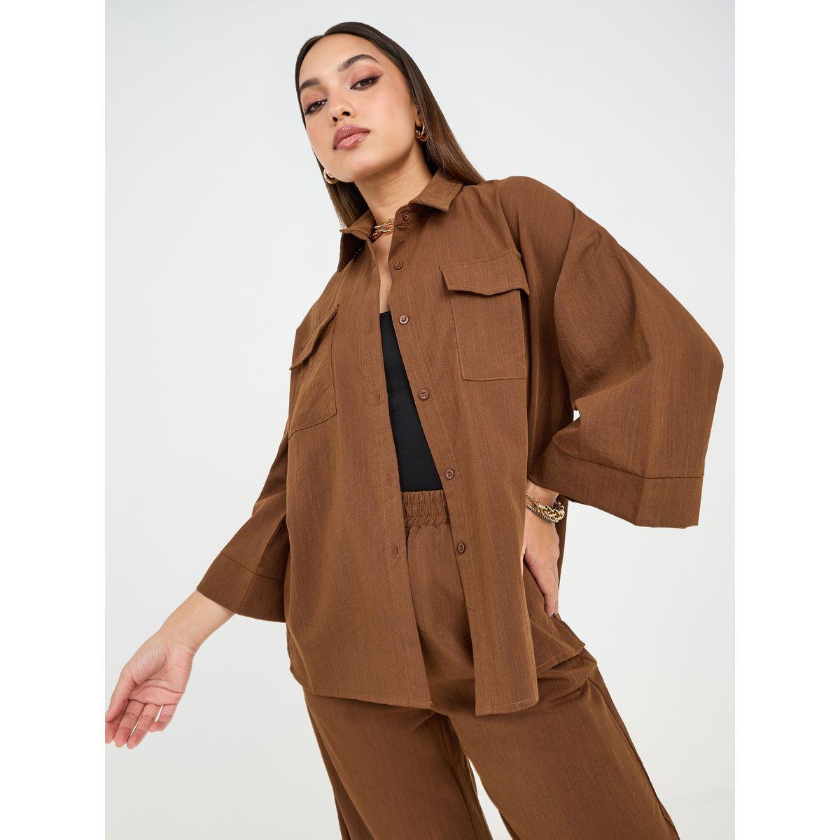 بلوزة طويلة واسعة مع جيوب بطية-women-clothing-shirtsandblouses-shirts-image-1