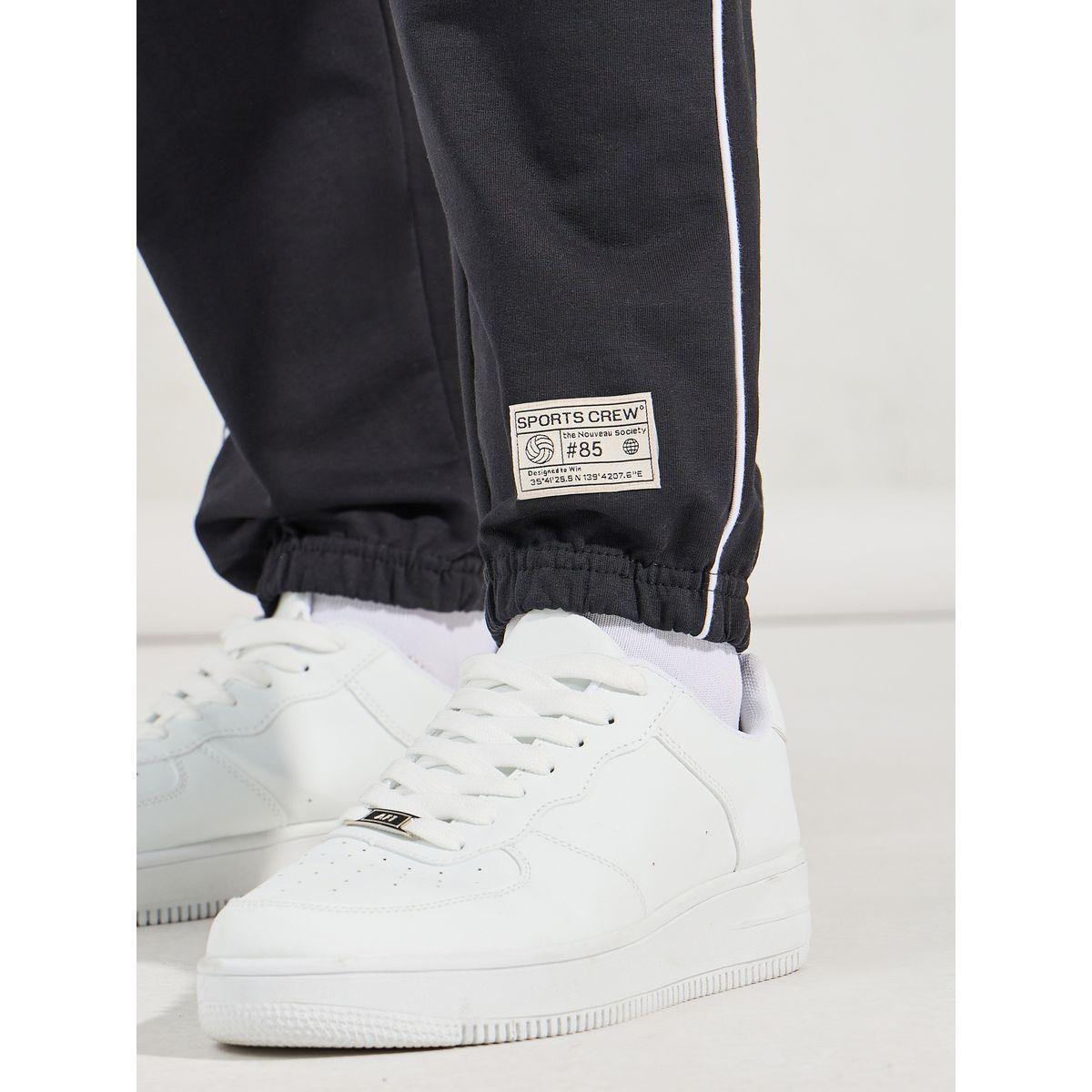 جوغر تيري بقصة مريحة وتفاصيل محزوزة-men-clothing-bottoms-joggers-image-5