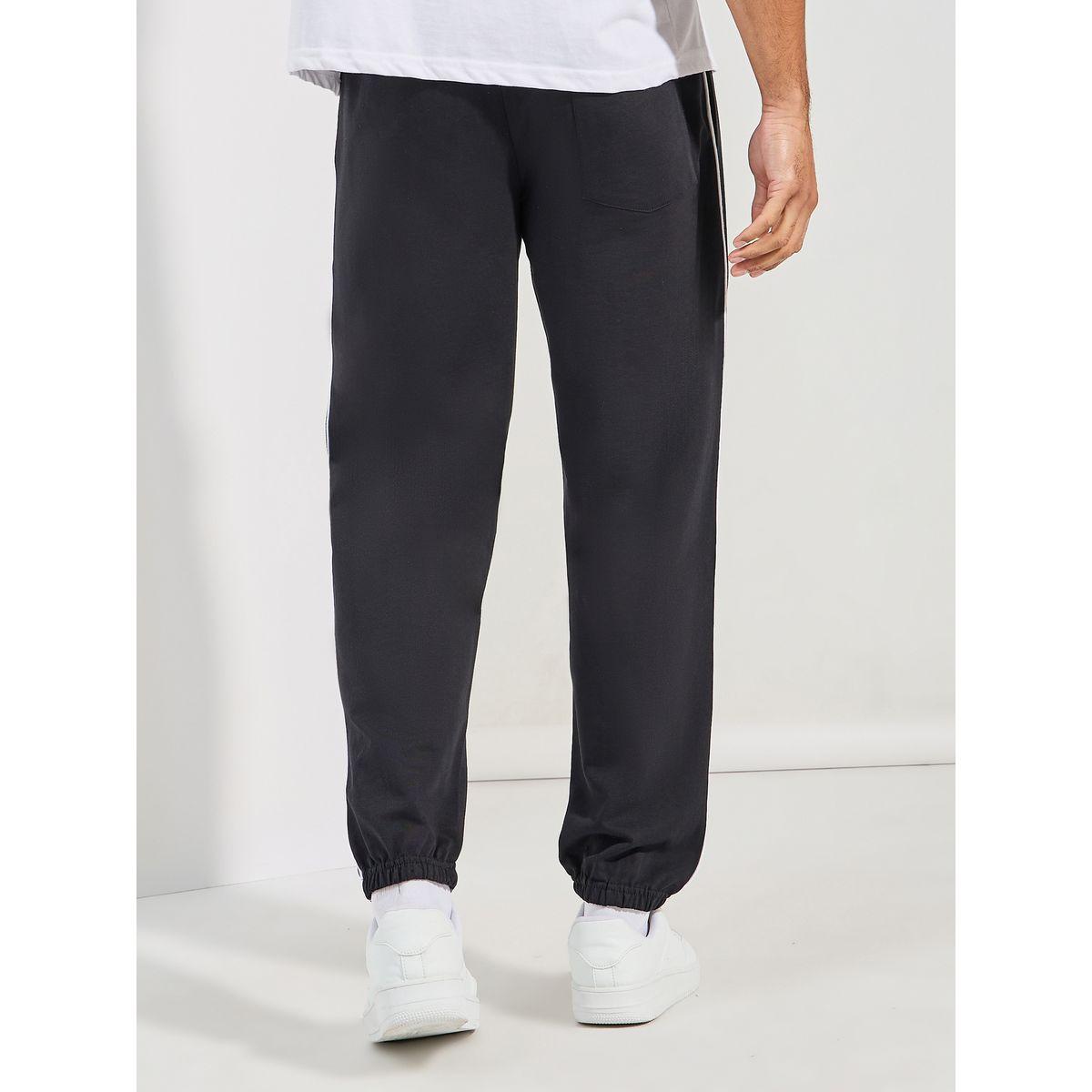 جوغر تيري بقصة مريحة وتفاصيل محزوزة-men-clothing-bottoms-joggers-image-6