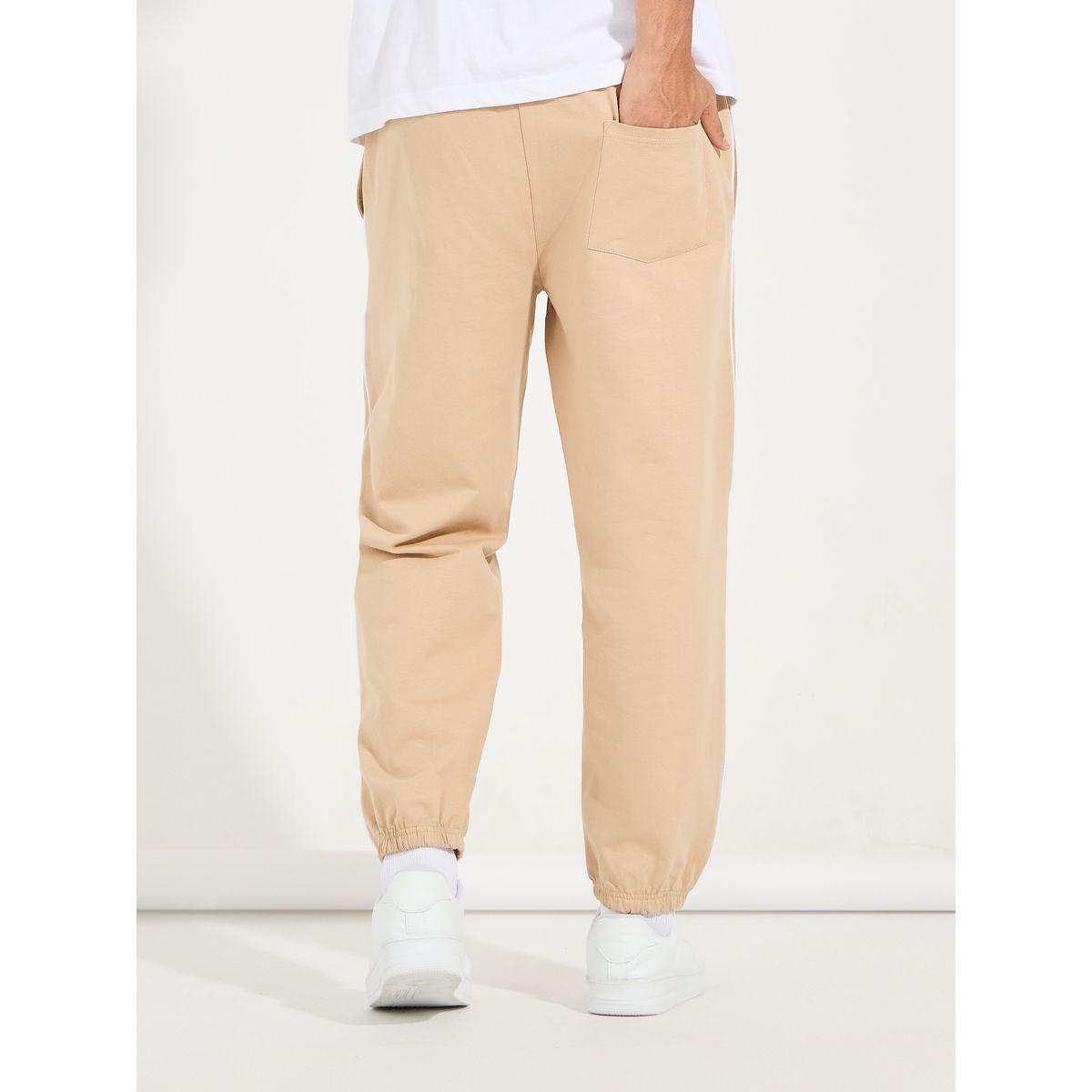 جوغر تيري بقصة مريحة وتفاصيل محزوزة-men-clothing-bottoms-joggers-image-5