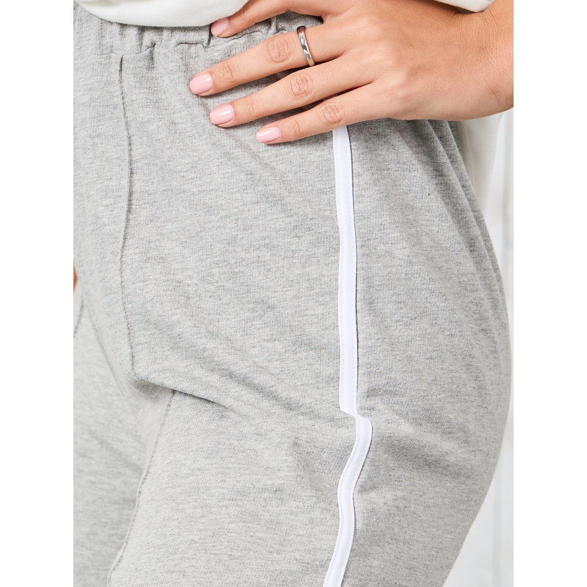 بنطال بأرجل واسعة وتداخلات محزوزة-women-clothing-bottoms-trousers-image-3