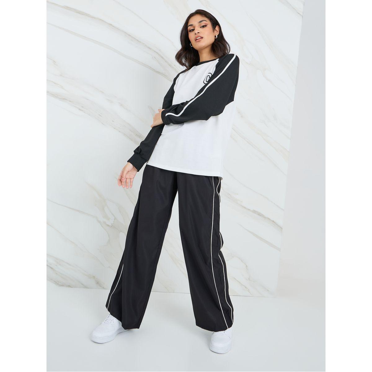 Styli Oversized Graphic Print Raglan Sleeve T-Shirt-women-clothing-tshirts-image-2