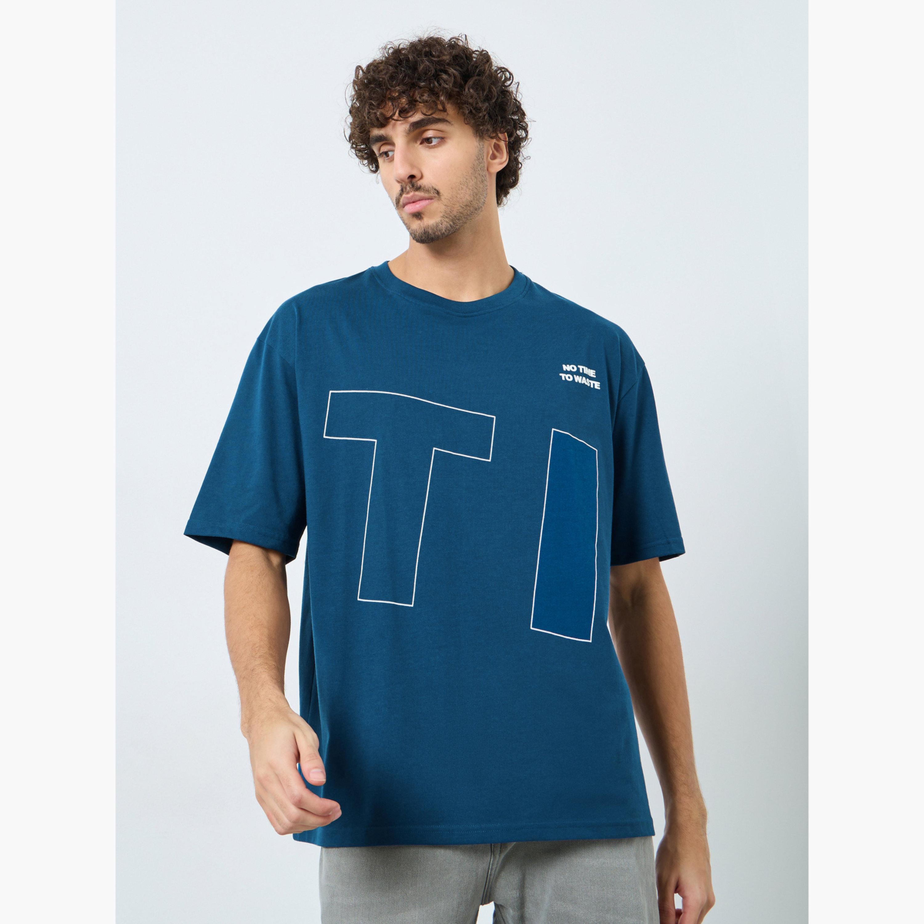 ستايلي - تي شيرت تصميم واسع برسومات أمامية وخلفية للرجال-men-clothing-tshirtsandpolos-tshirts-image-1