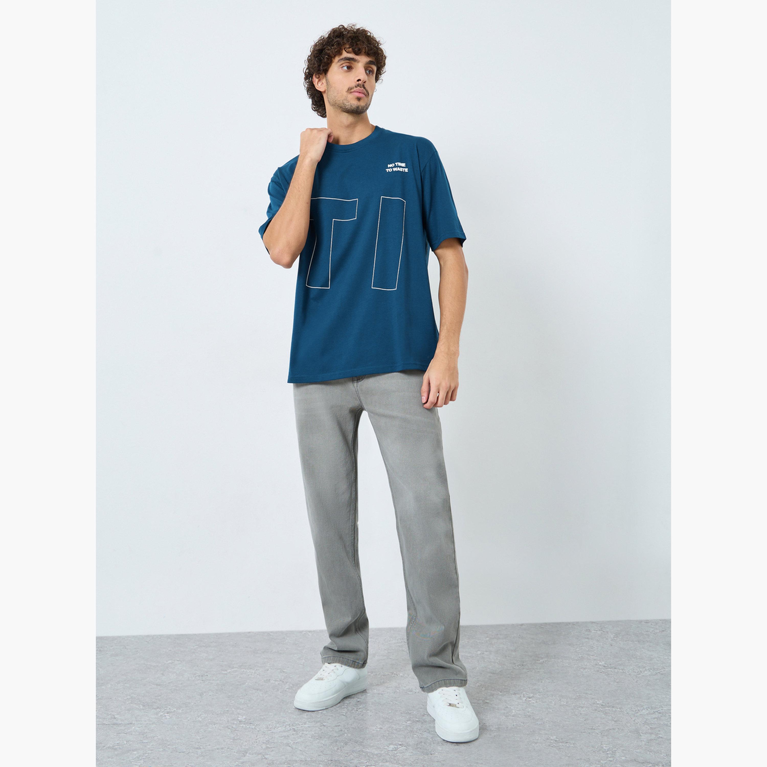 ستايلي - تي شيرت تصميم واسع برسومات أمامية وخلفية للرجال-men-clothing-tshirtsandpolos-tshirts-image-2