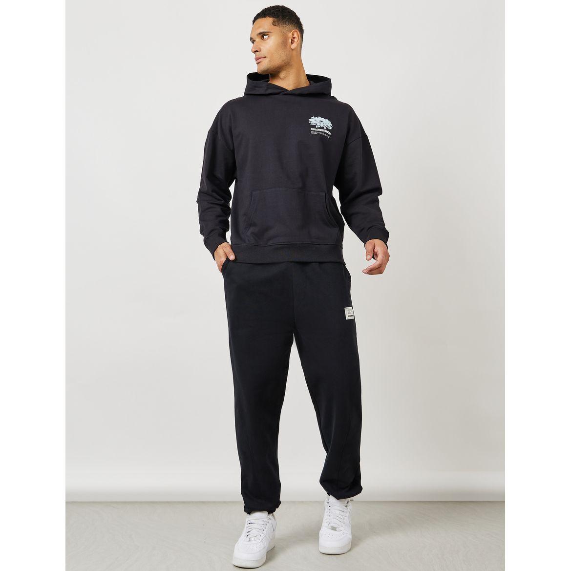 جوغر مزين بشارة وأربطة غلق-men-clothing-bottoms-joggers-image-2