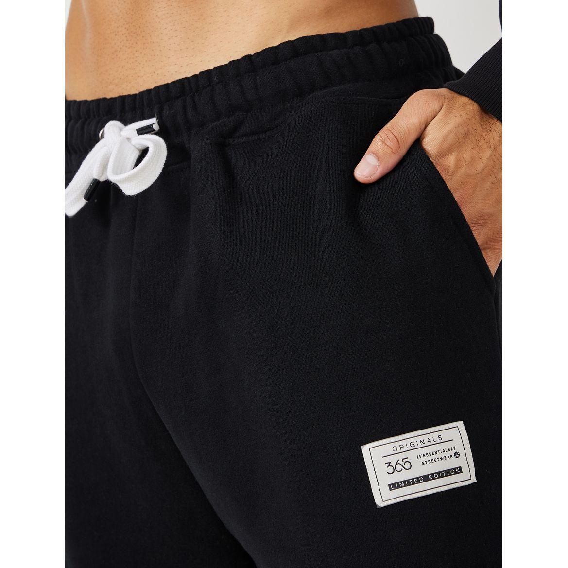 جوغر مزين بشارة وأربطة غلق-men-clothing-bottoms-joggers-image-3
