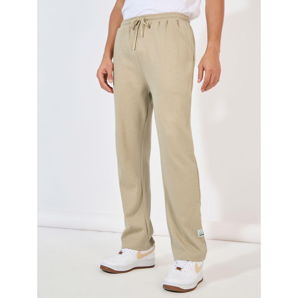 جوغر فضفاض مزين بشارة-men-clothing-bottoms-joggers-image-1