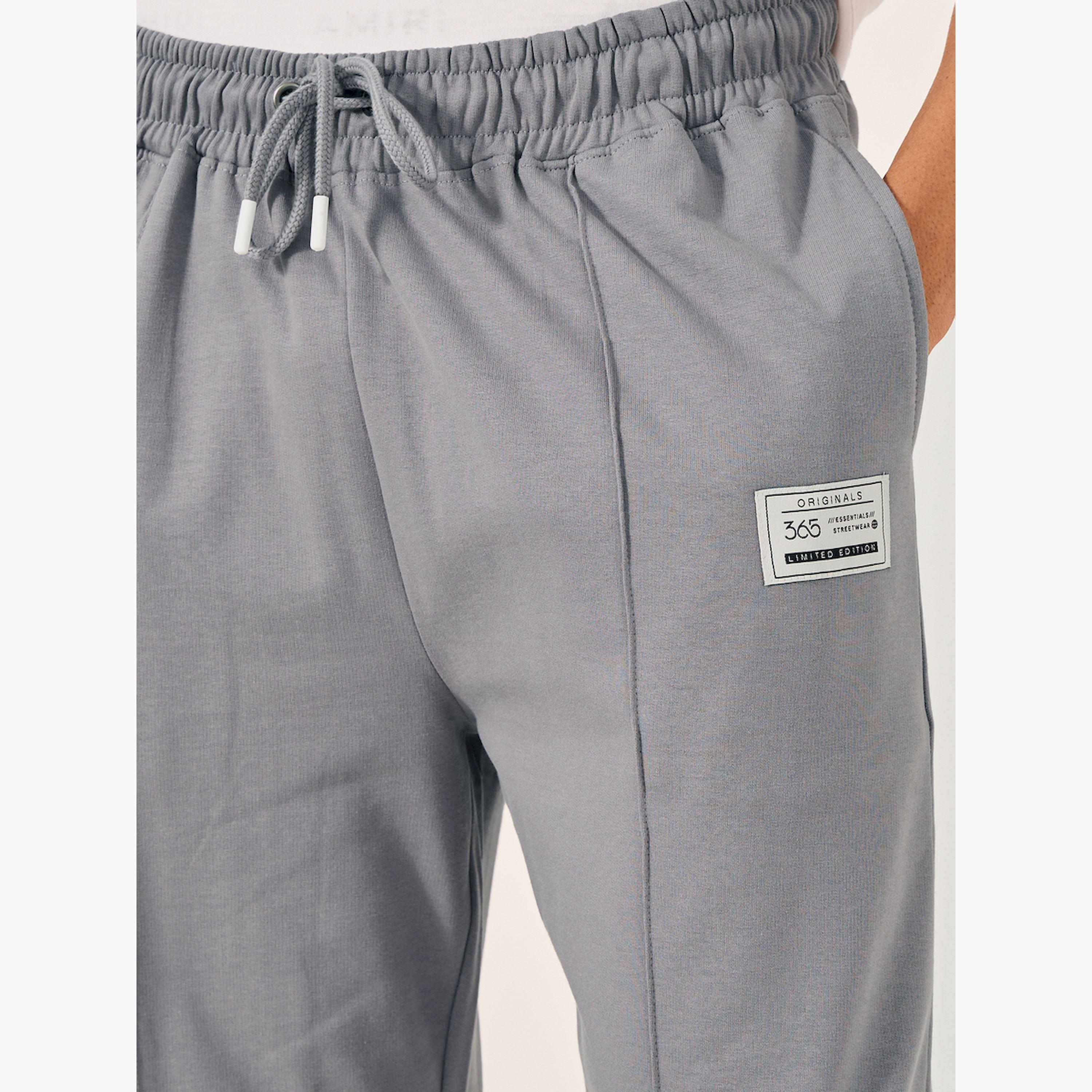ستايلي - بنطال رياضي صوف واسع الساق بكسرة مع تفاصيل شارة-men-clothing-bottoms-joggers-image-3
