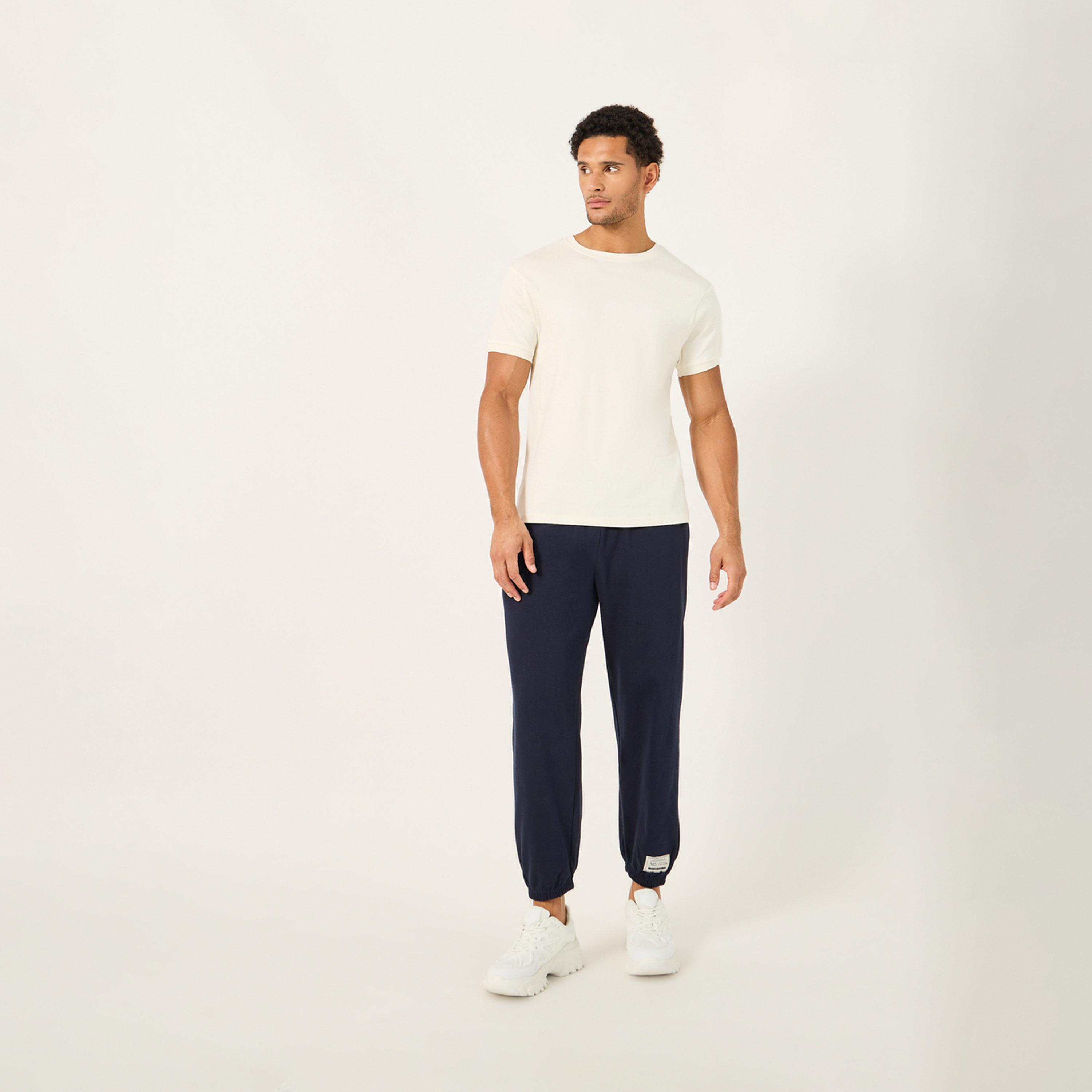 ستايلي - بنطال رياضي صوف بقصة مريحة بتفاصيل شعار مع جيوب بسحاب-men-clothing-bottoms-joggers-image-2