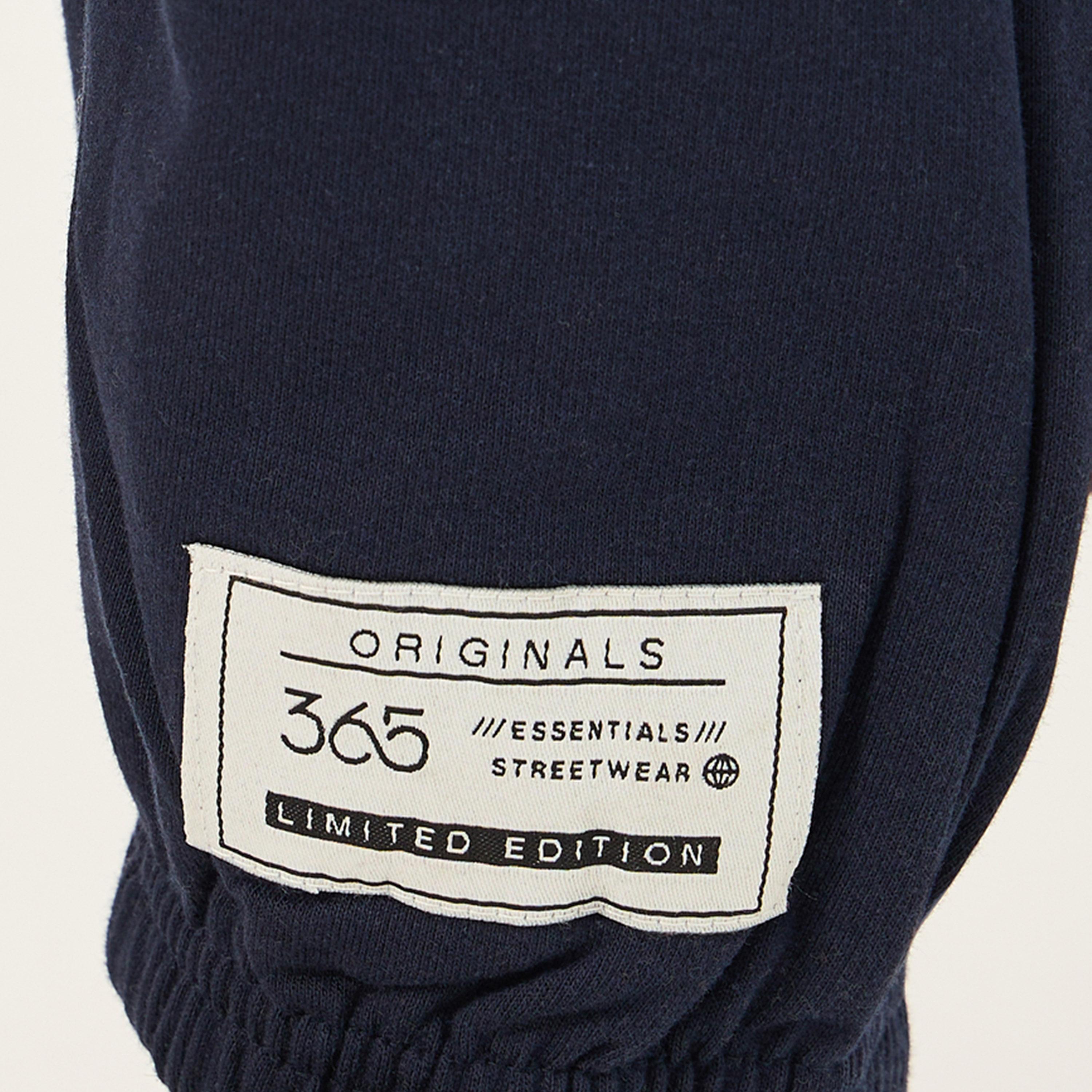 ستايلي - بنطال رياضي صوف بقصة مريحة بتفاصيل شعار مع جيوب بسحاب-men-clothing-bottoms-joggers-image-3