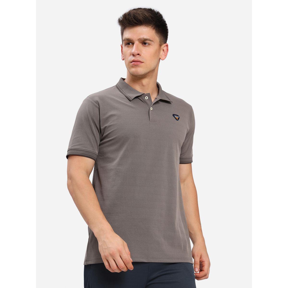 تيشيرت بولو مزين بشارة تكنوسبورت × ستايلي-men-clothing-sportswearandactivewear-tshirtsandpolos-image-1