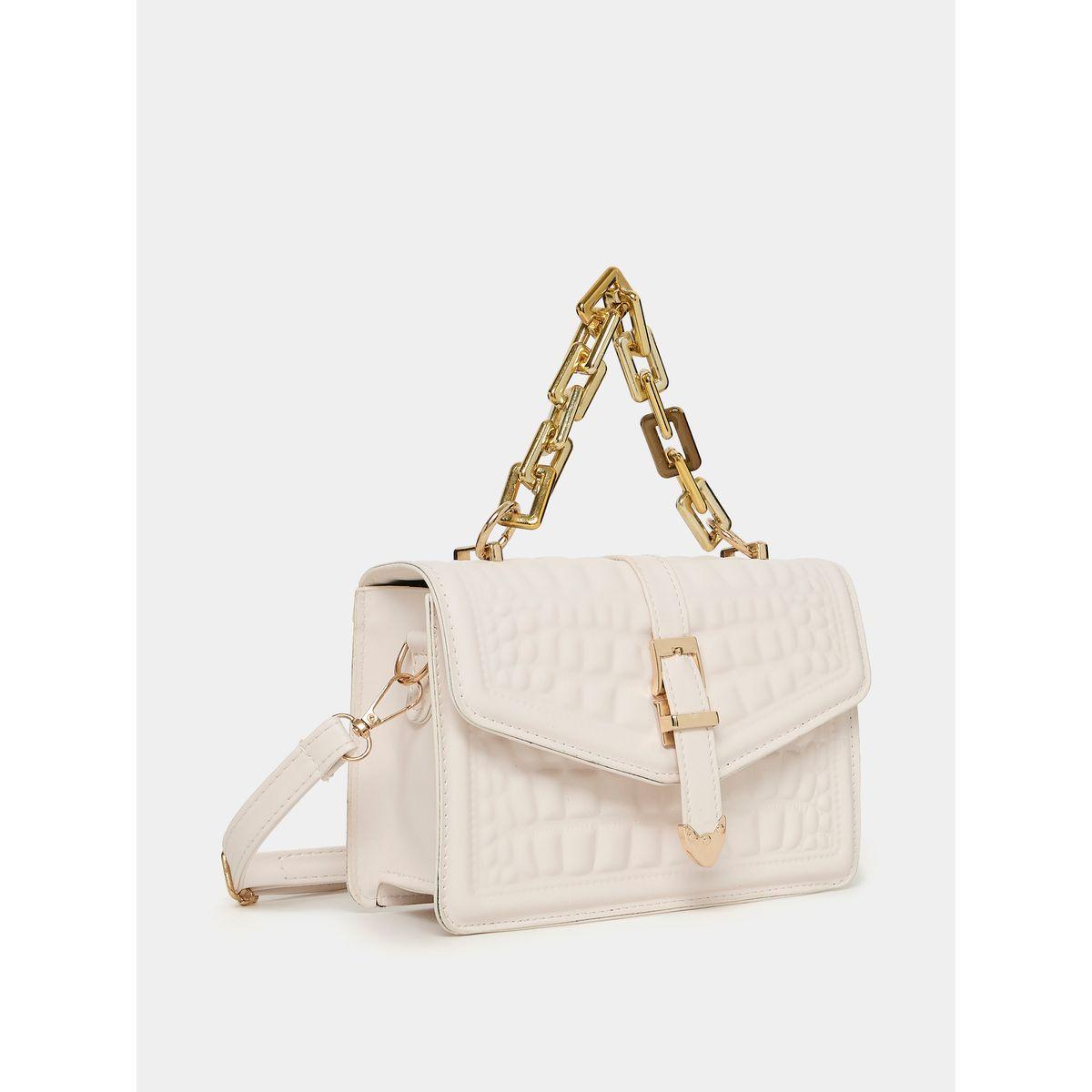 شنطة يد بتفاصيل بارزة الملمس-women-bagsandwallets-handbags-image-1