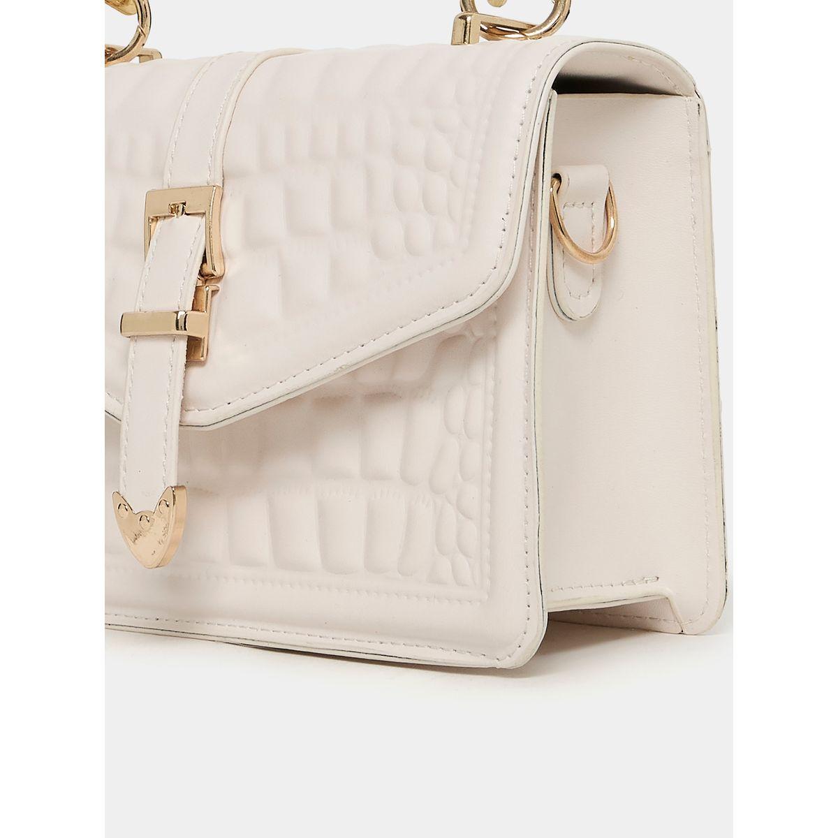 شنطة يد بتفاصيل بارزة الملمس-women-bagsandwallets-handbags-image-3