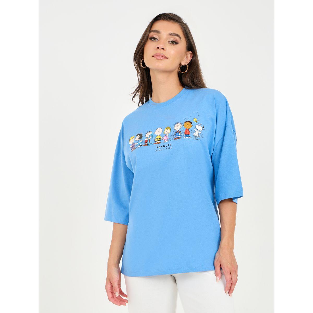 تيشيرت واسع باكتاف منخفضة وطبعة جرافيك-women-clothing-tshirts-image-1
