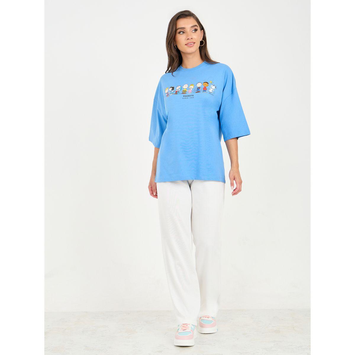 تيشيرت واسع باكتاف منخفضة وطبعة جرافيك-women-clothing-tshirts-image-2