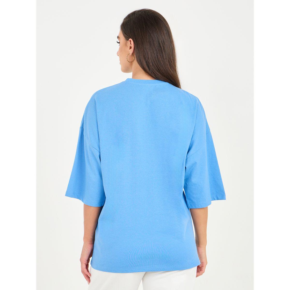 تيشيرت واسع باكتاف منخفضة وطبعة جرافيك-women-clothing-tshirts-image-4