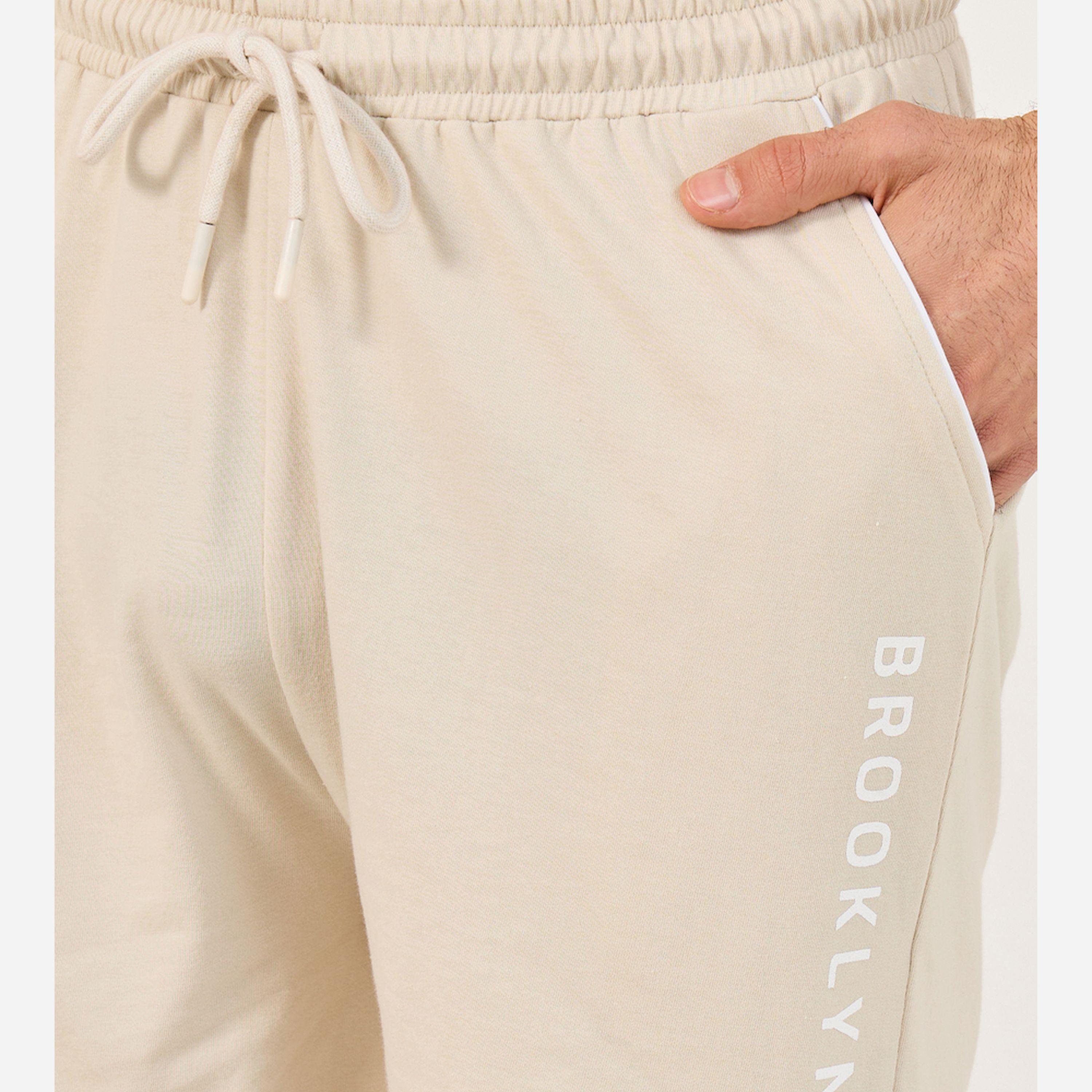ستايلي - أنوايند طقم بيجامة مكون من تي شيرت وشورت مطبوع عليه شعار-men-clothing-nightwear-sets-image-5