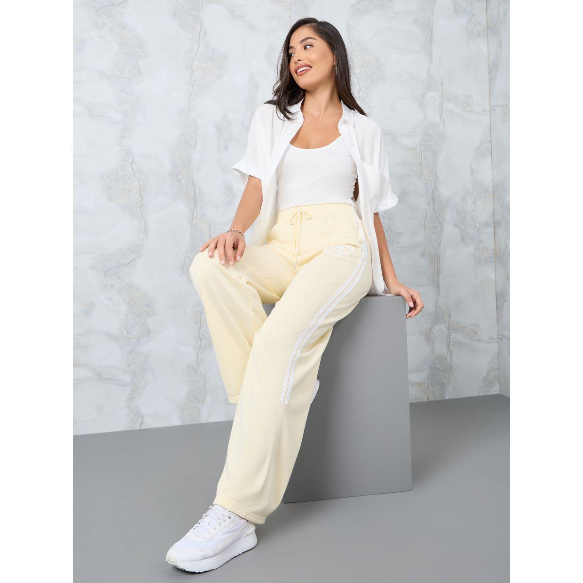 جوغر بقصة مريحة وتفاصيل مُطرّزة-women-clothing-bottoms-joggers-image-1