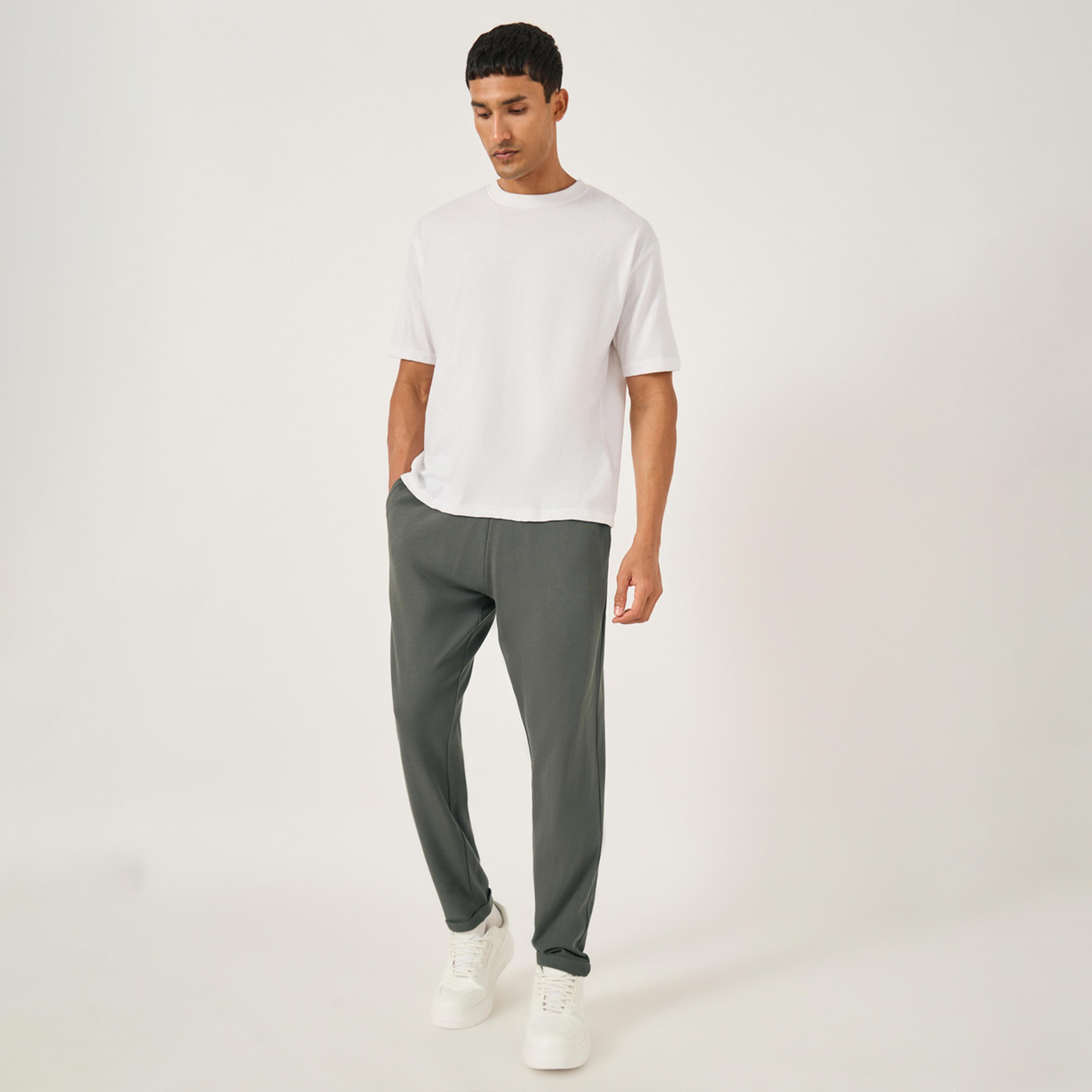 ستايلي - بنطال بيكيه محبوك بقصّة ضيقة وحاشية مطوية-men-clothing-bottoms-trousersandchinos-trousers-image-2