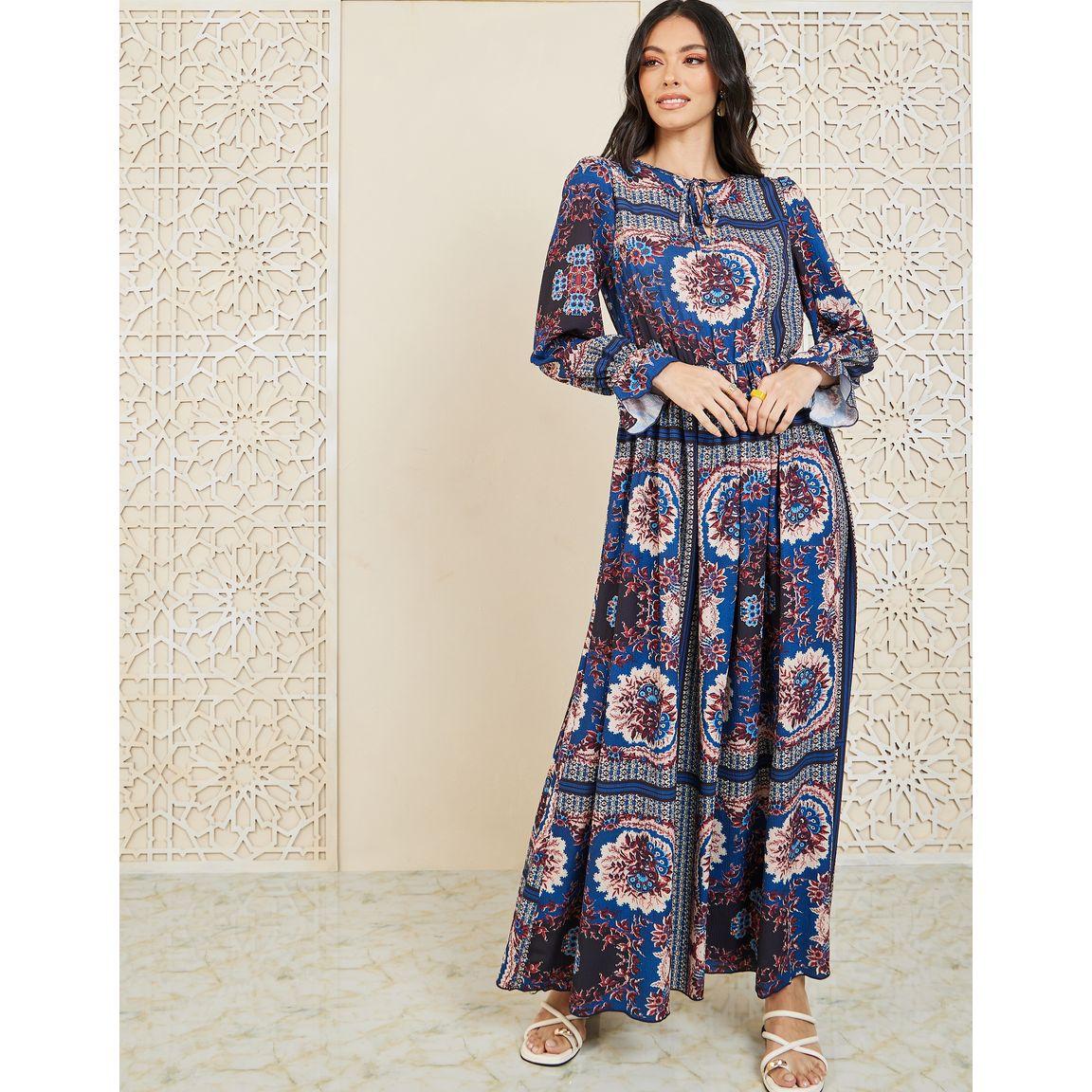 فستان طويل مطبع بزهور مع تفاصيل كسرات-women-clothing-dresses-image-1