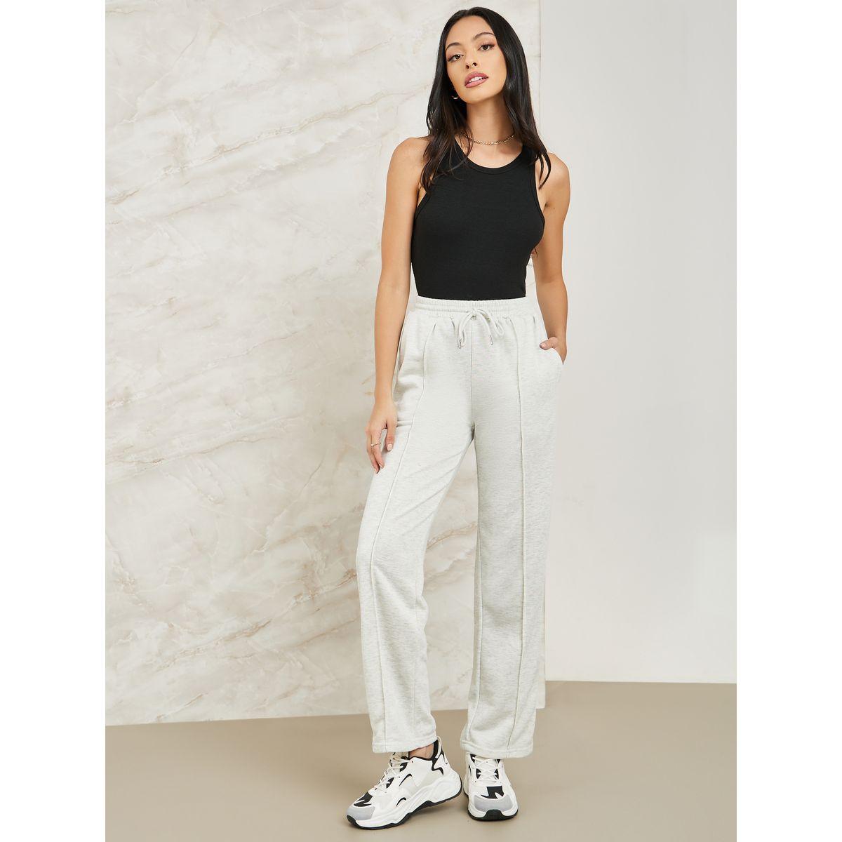 جوغر بتفاصيل مدروزة ورباط خصر-women-clothing-bottoms-joggers-image-1