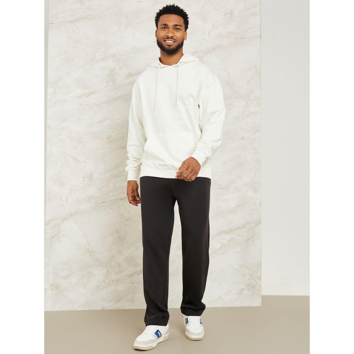 بنطال محبوك بقصة مريحة-men-clothing-bottoms-trousersandchinos-trousers-image-1