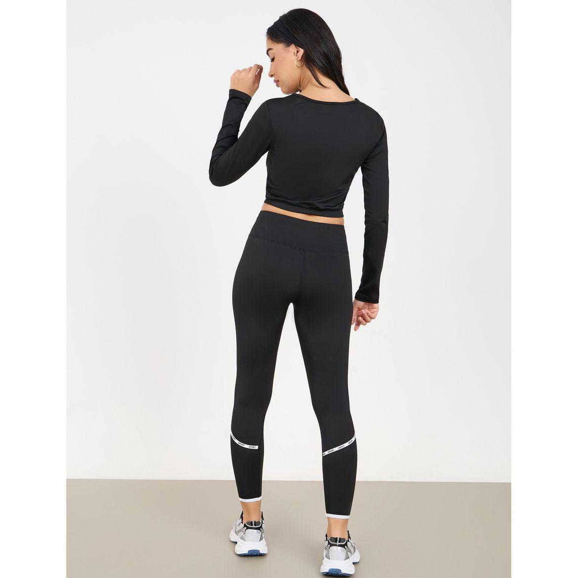 Styli Active Solid Crop Top with Thumbhole Detail with Side Striped Leggings Set-women-clothing-sportswearandactivewear-trackpantsandtracksuits-image-7