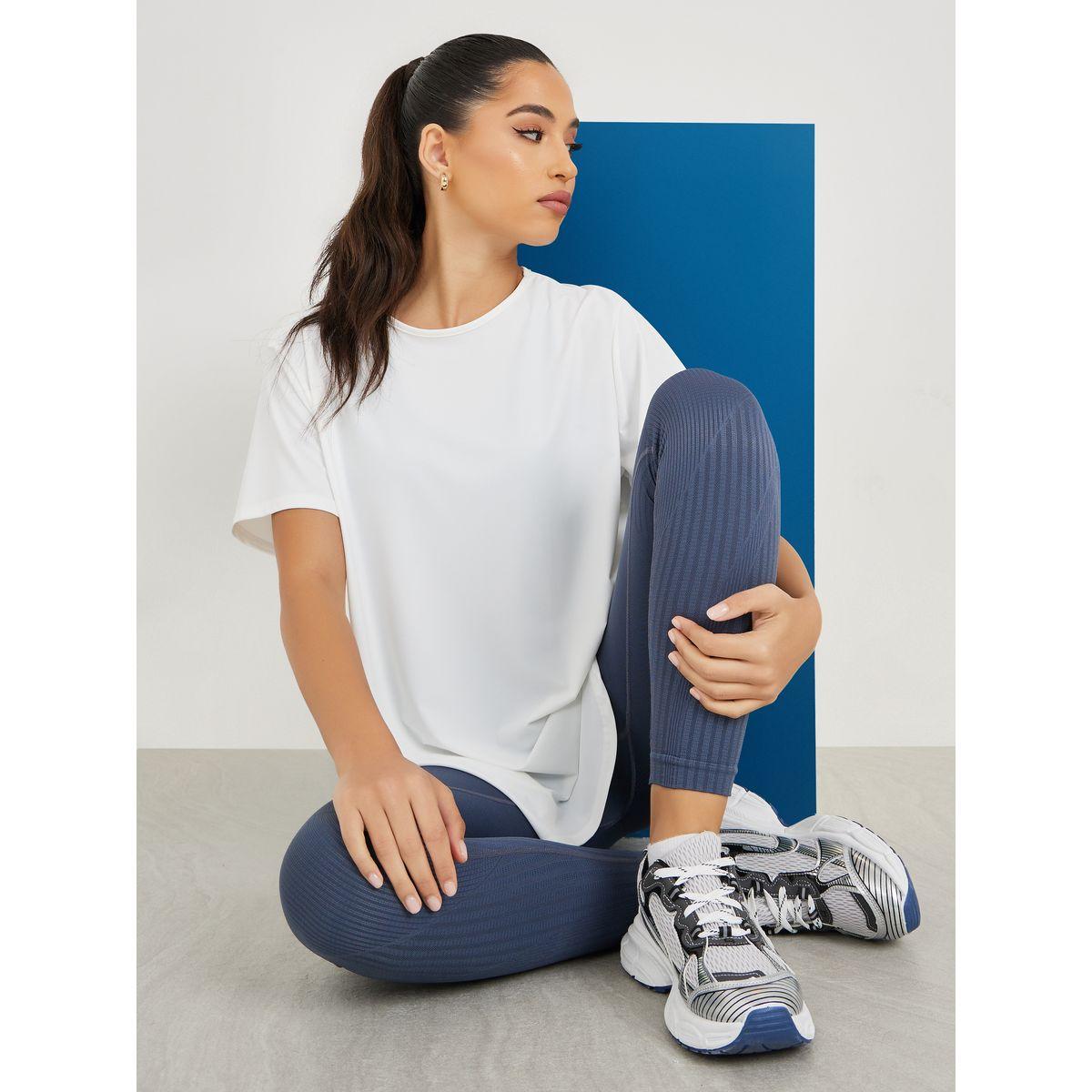 ستيلي أكتيف وسط الظهر الشعار البسيط في خط اليوغا الفضفاض-women-clothing-sportswearandactivewear-tshirtsandvests-image-1