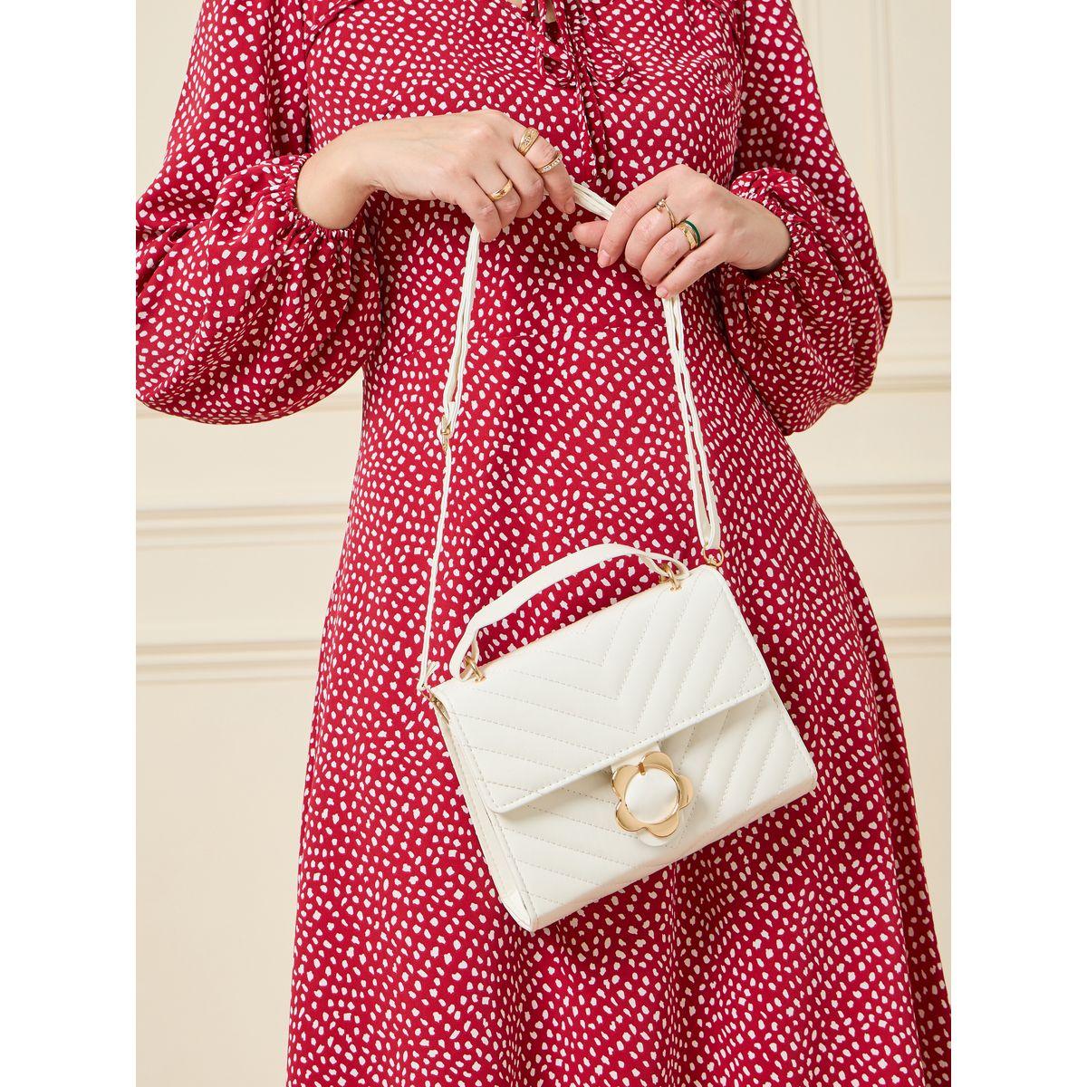 شنطة يد بتفاصيل بارزة الملمس-women-bagsandwallets-handbags-image-6