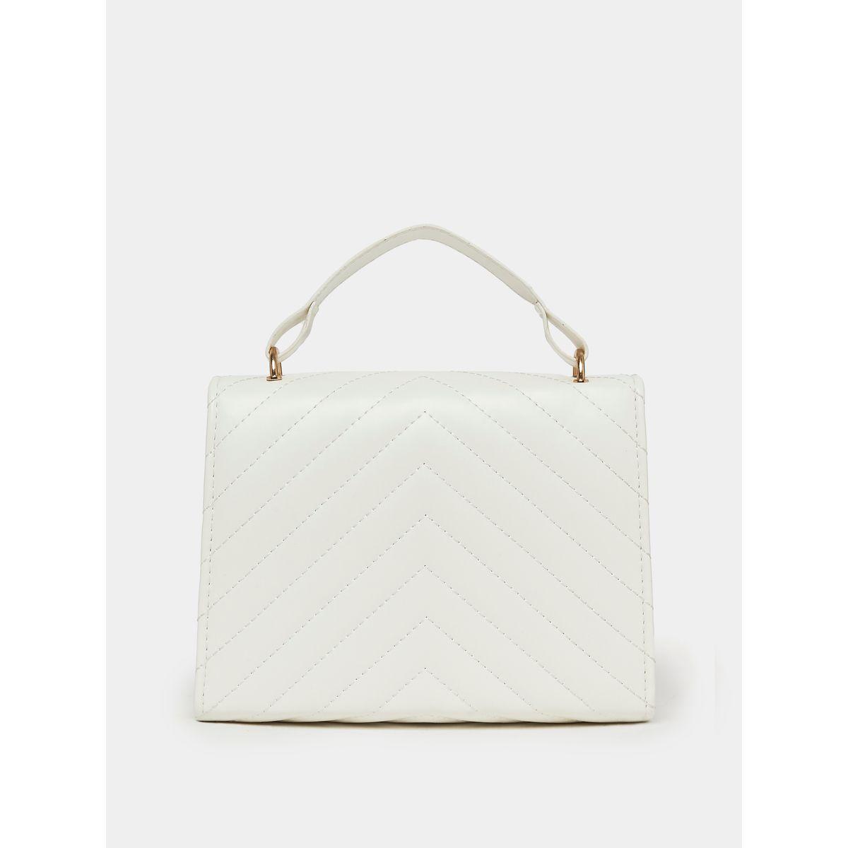 شنطة يد بتفاصيل بارزة الملمس-women-bagsandwallets-handbags-image-3