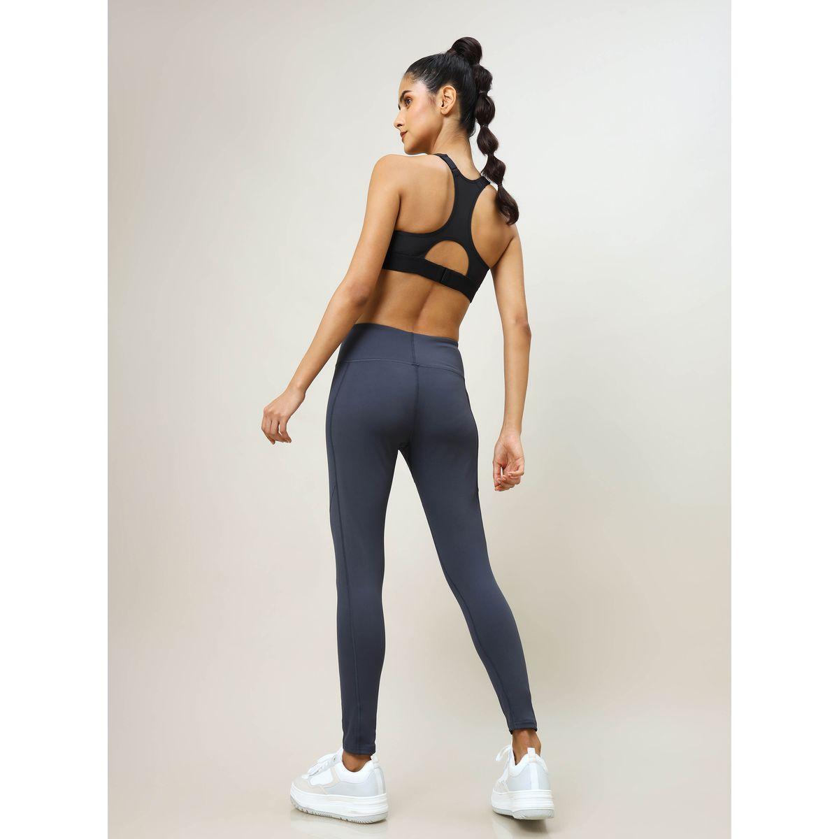 ليقنز رياضي مزين بدرزات وتفاصيل جيب تكنوسبورت × ستايلي-women-clothing-sportswearandactivewear-bottoms-image-1